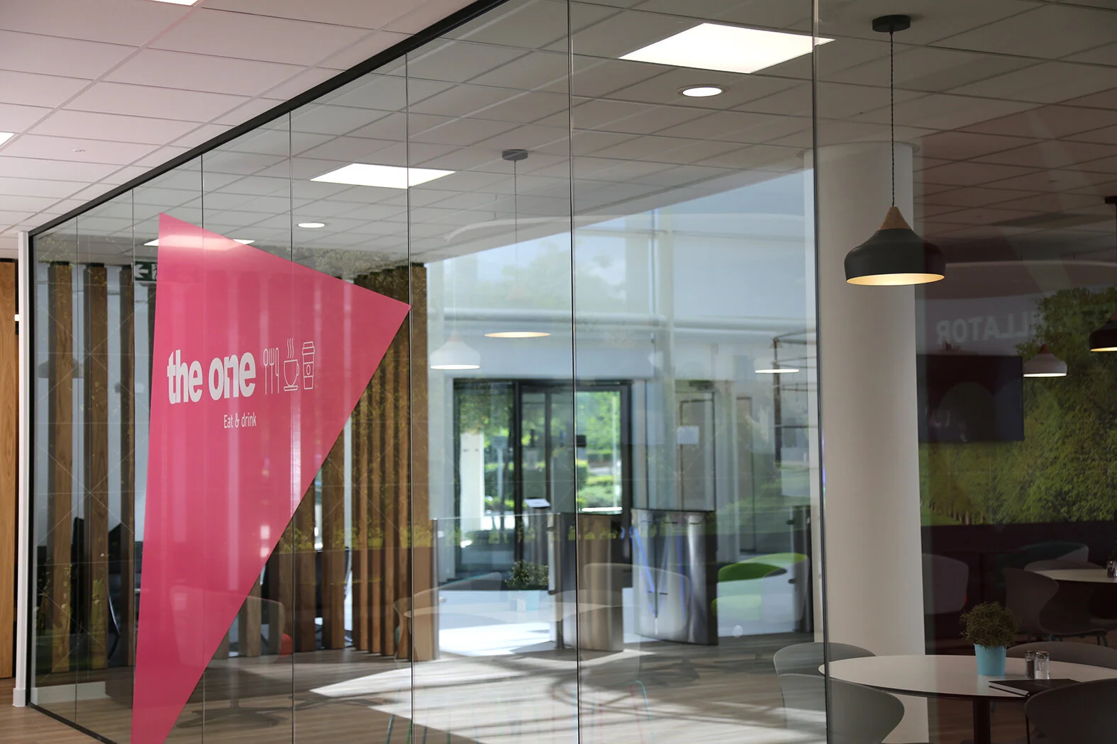  Interior graphics for Ipsen UK Headquarters. Design work consisted of information, wayfinding and social area graphics throughout the entire building. 