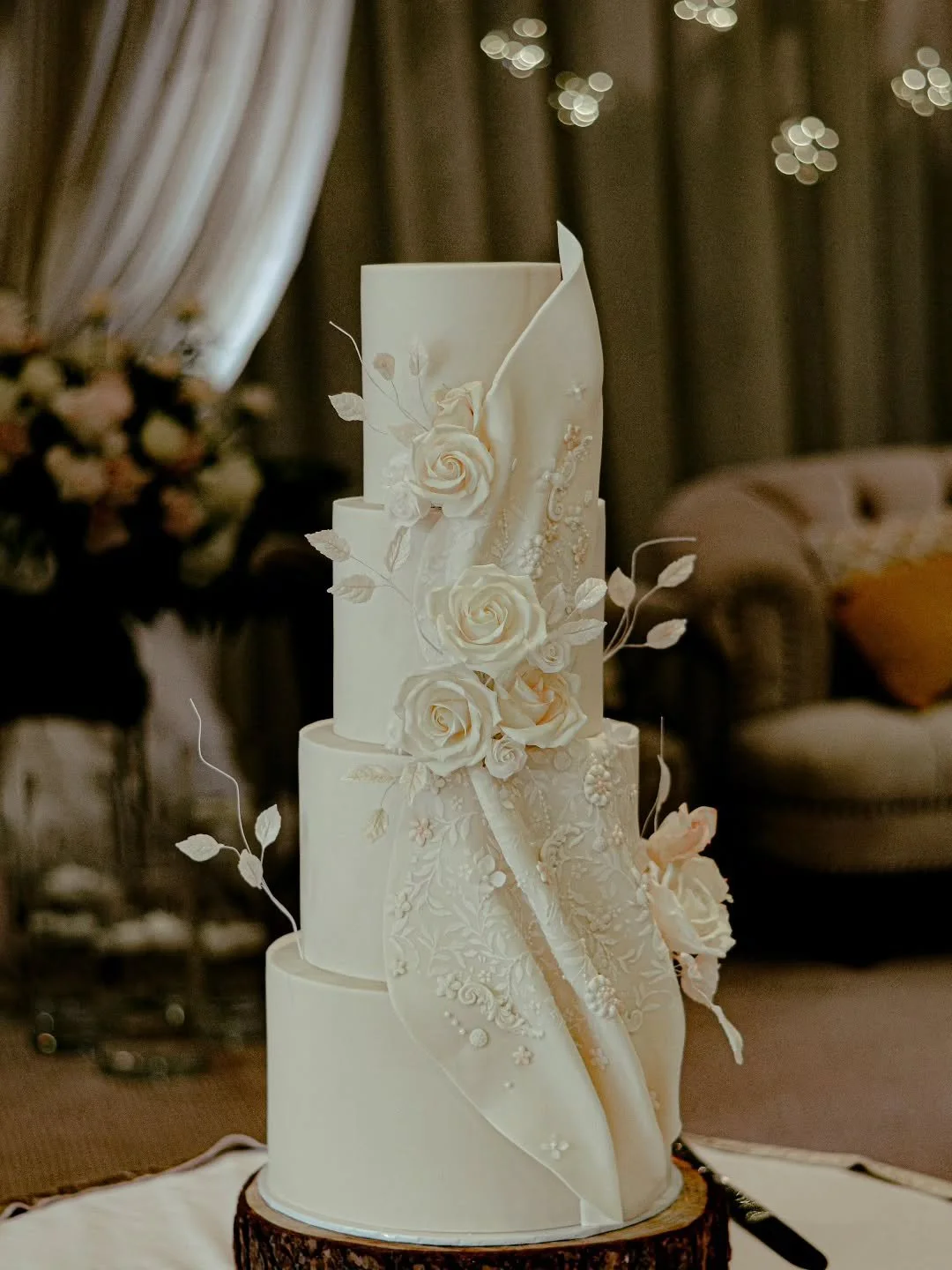 Sugar flowers &amp; foilage paired with flowing decorated drapes....what's not to love 🤍