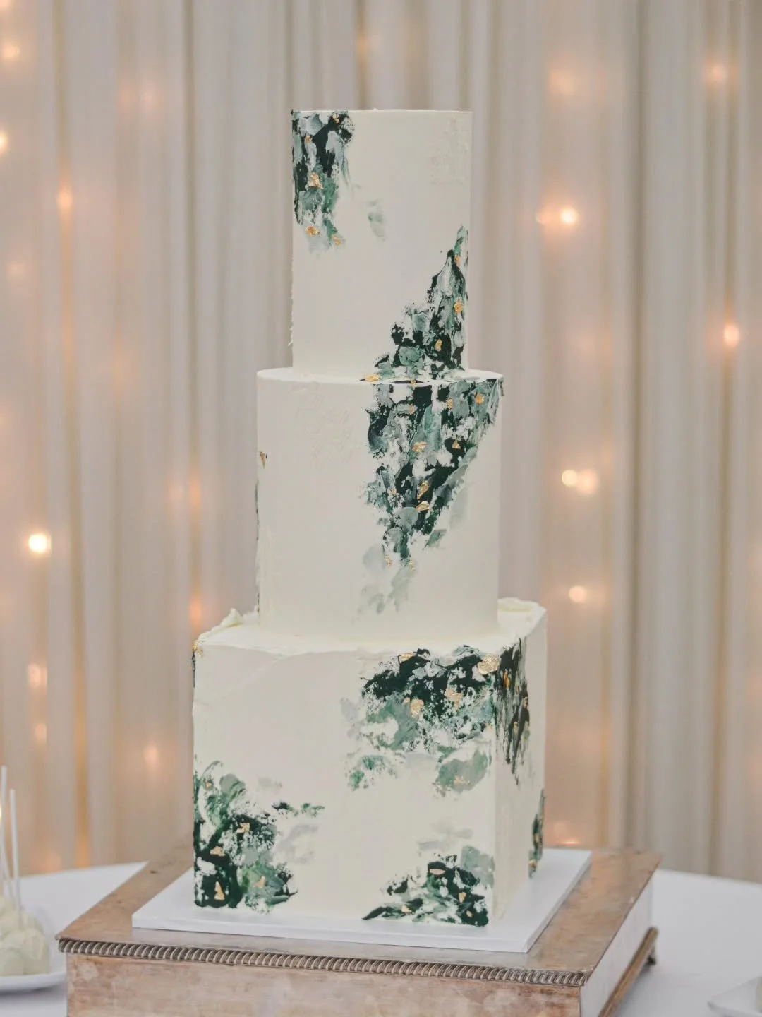 Combining different shaped tiers along with texture!  Eliminating the need to add flowers but still creating an impact 💚!