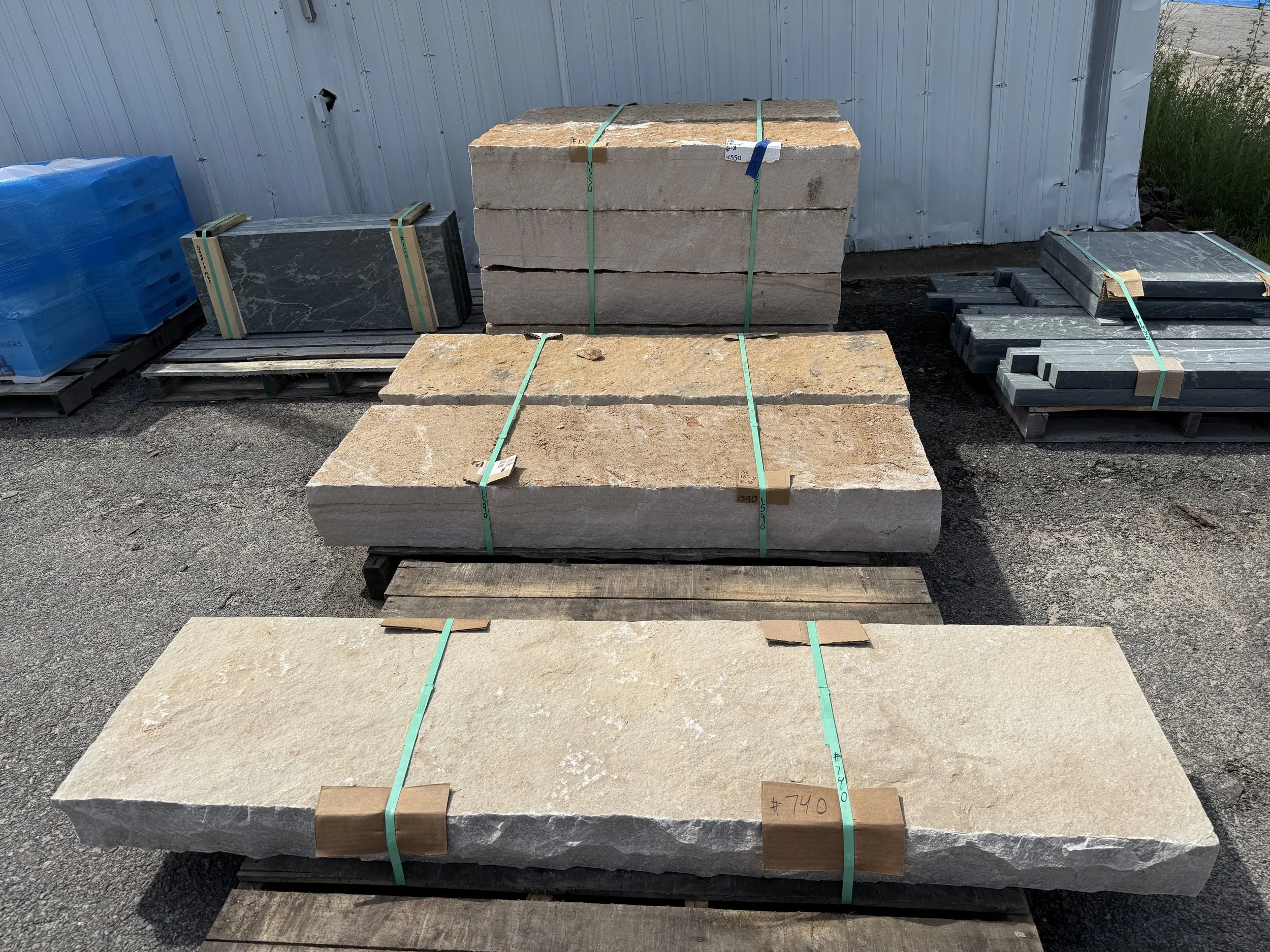 Sandy Creek split faced steps 18" x 48", 18" x 60" & front step sawn then hand rock-faced 18" x 72"