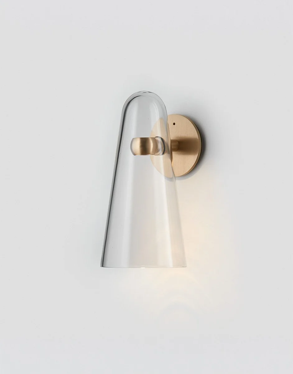 Articolo-Studios-Domi-Wall-Sconce-Brass-Clear-ON-scaled-1.jpg