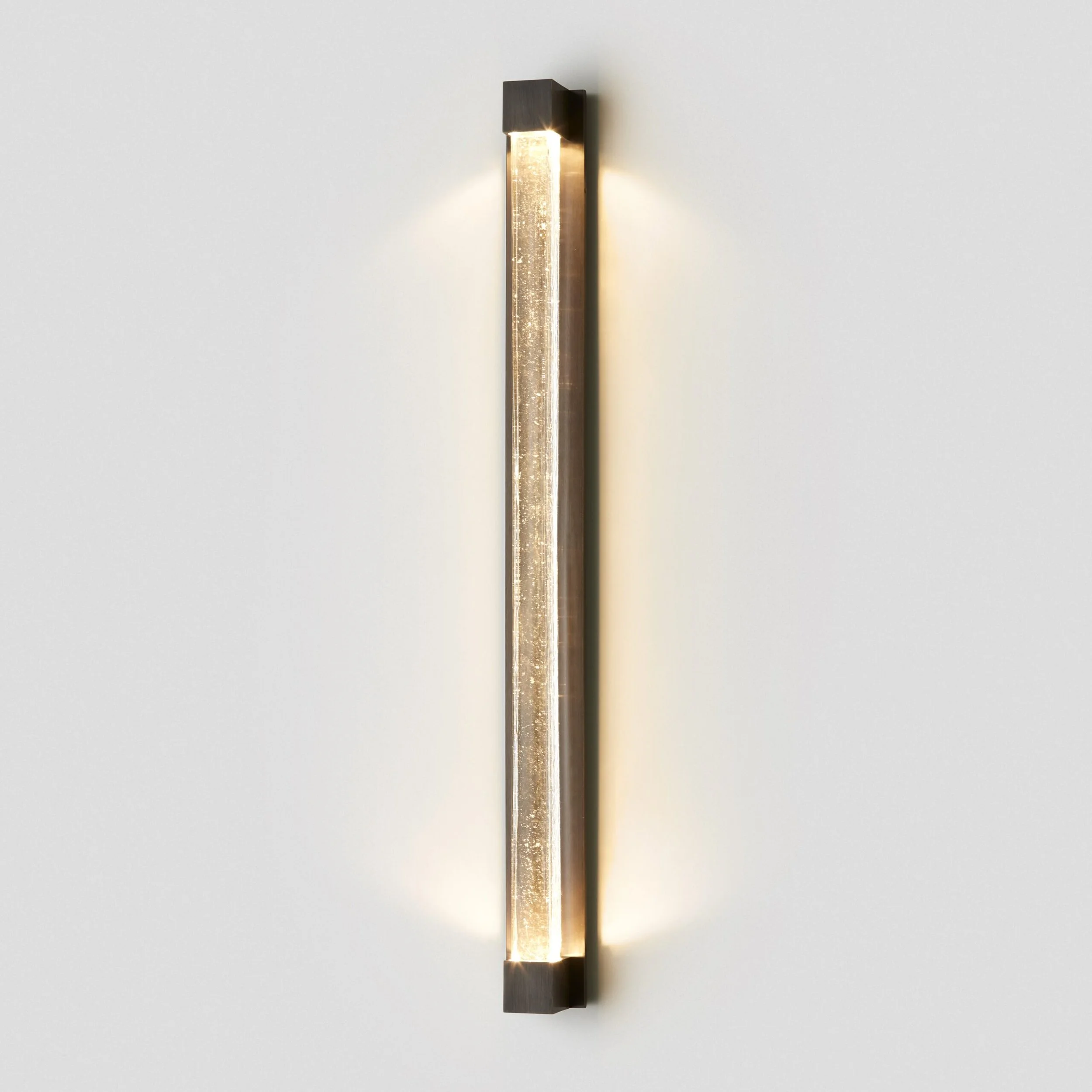Articolo-Lighting-Fini-Wall-Sconce-Clear-Mid-Bronze-On-scaled.jpg