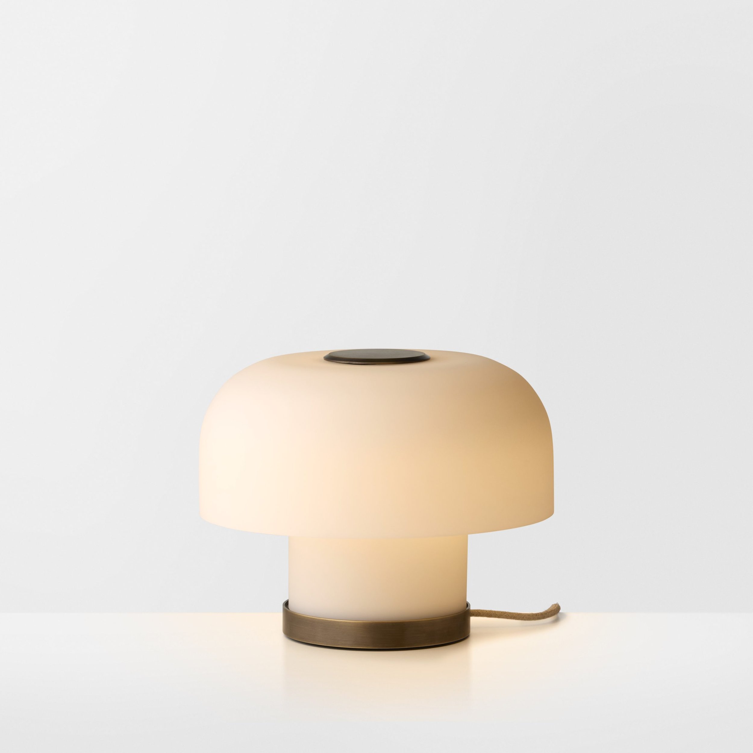 Articolo-Studios-Rolo-Double-Down-Table-Lamp-Mid-Bronze-Snow-Natural-Linen-ON-scaled.jpg
