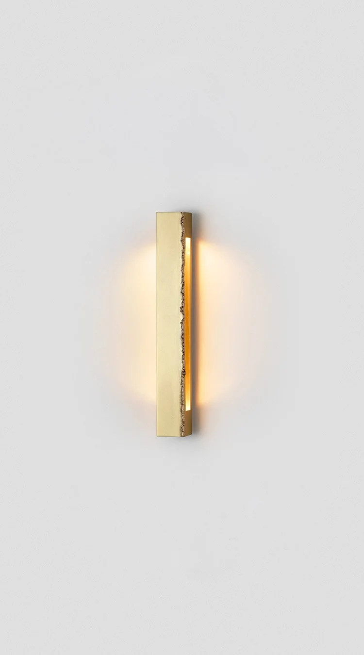 Articolo-Studios-Seam-Mini-Wall-Sconce-Brass-Angle-ON.jpg