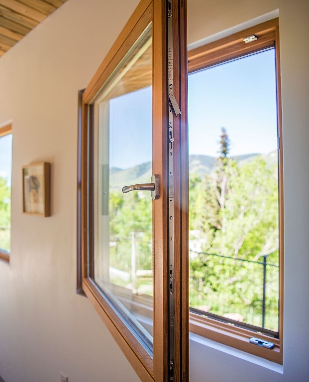 We ❤️ European-style tilt/turn windows. These custom windows were installed in our #netzeroenergy 407 Passivhaus project in Golden, CO. They meet the Passivhaus standard with triple-pane glass and 3 levels of seals to keep the building airtight. Not 