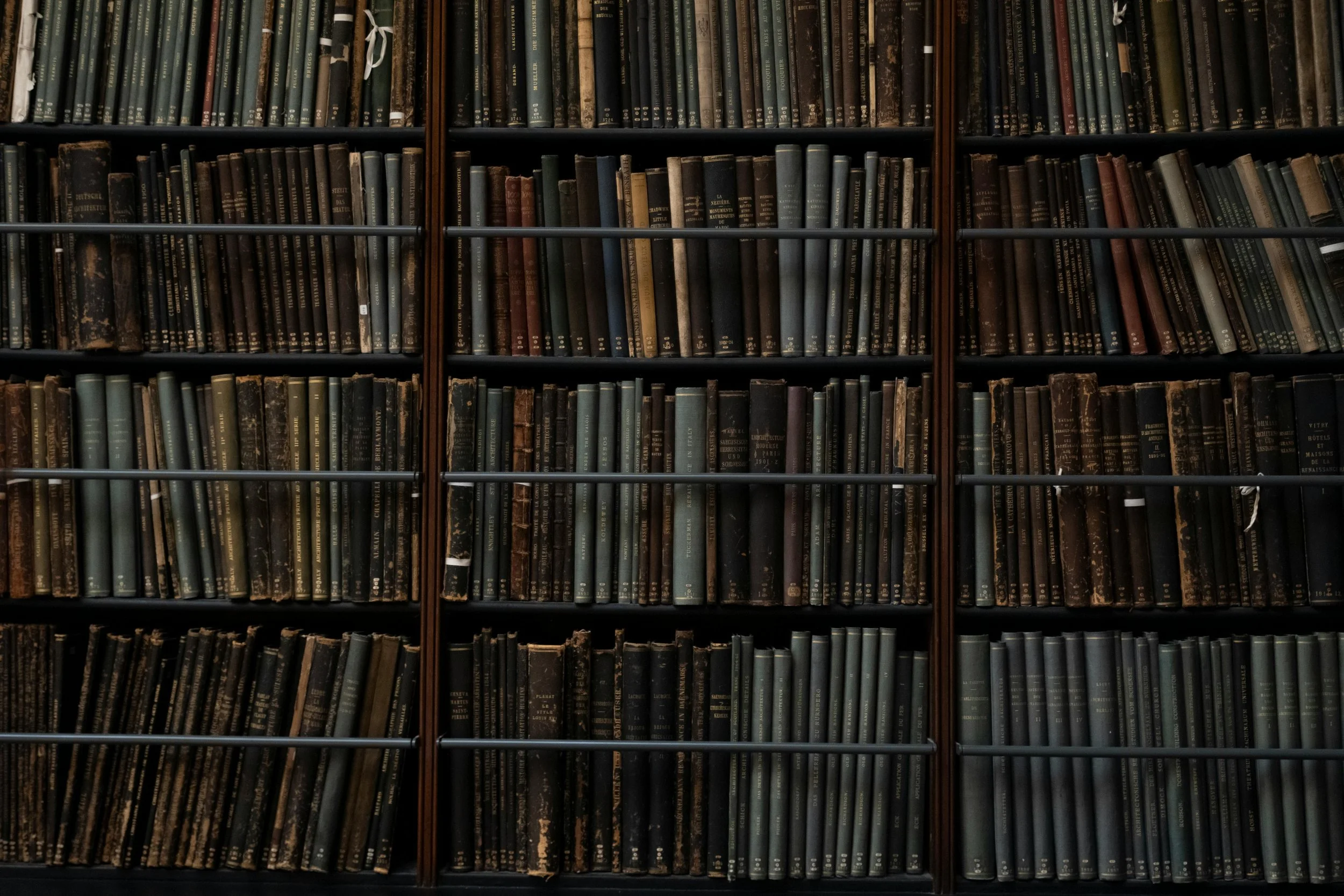 old books in a bookcase | how to use local archives