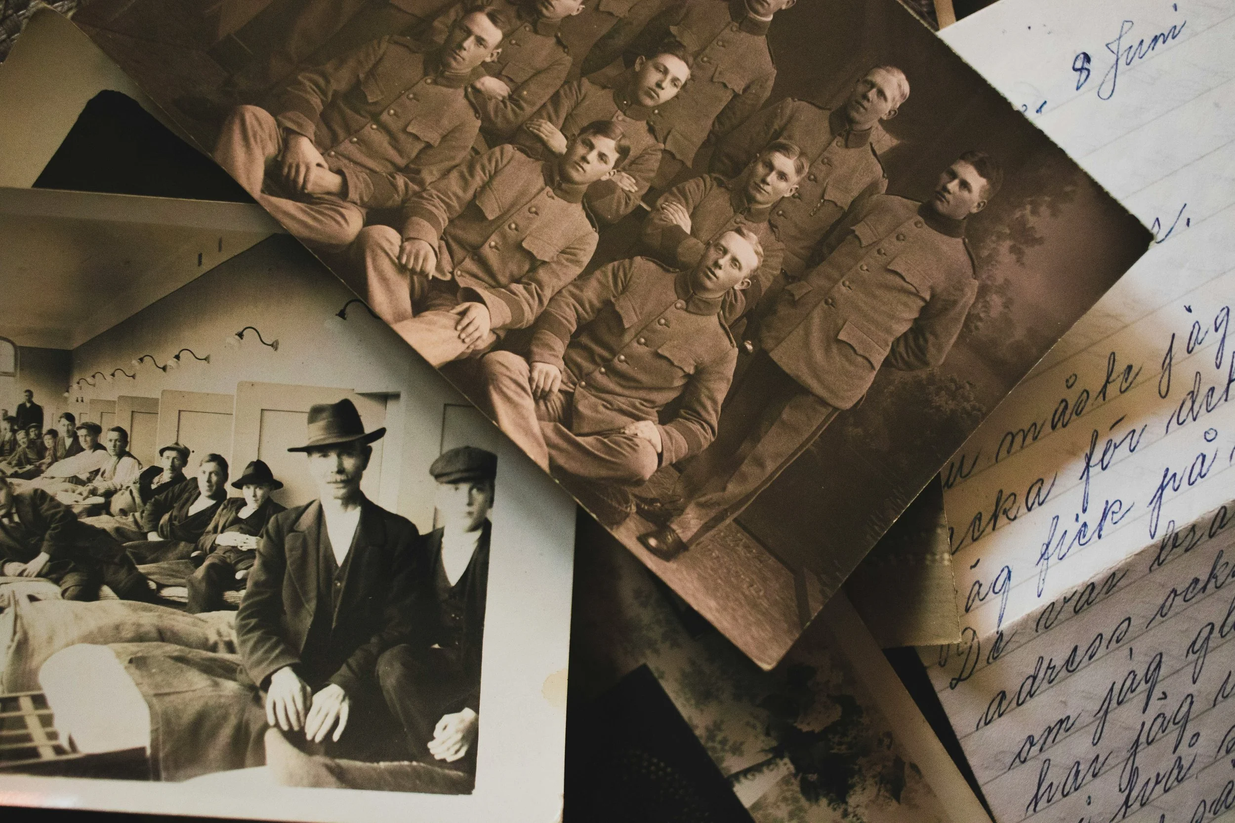 Vintage photos and a letter on a table