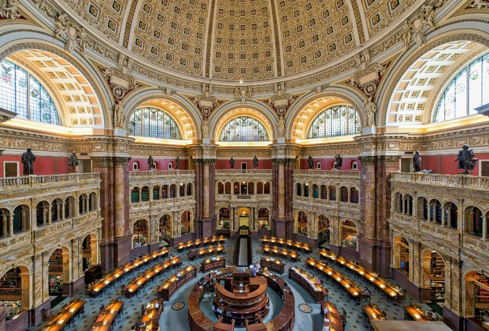 Grand reading room inside the Library of Congress, part of its vast archives and online collections supporting genealogy research.