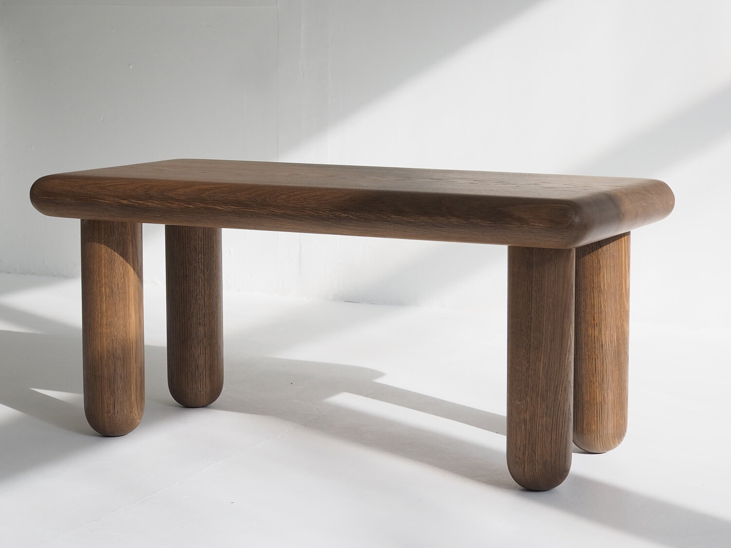 fumed-oak-cured-edge-coffee-table-minimal-design.jpg