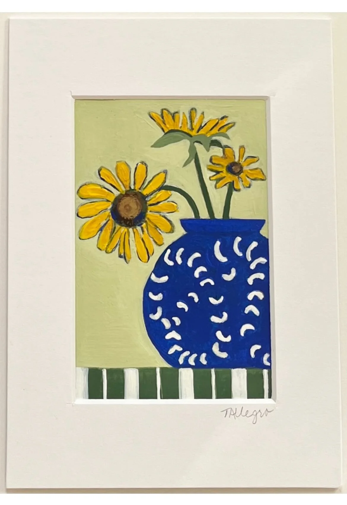 Sunflowers On A Green Striped Tablecloth