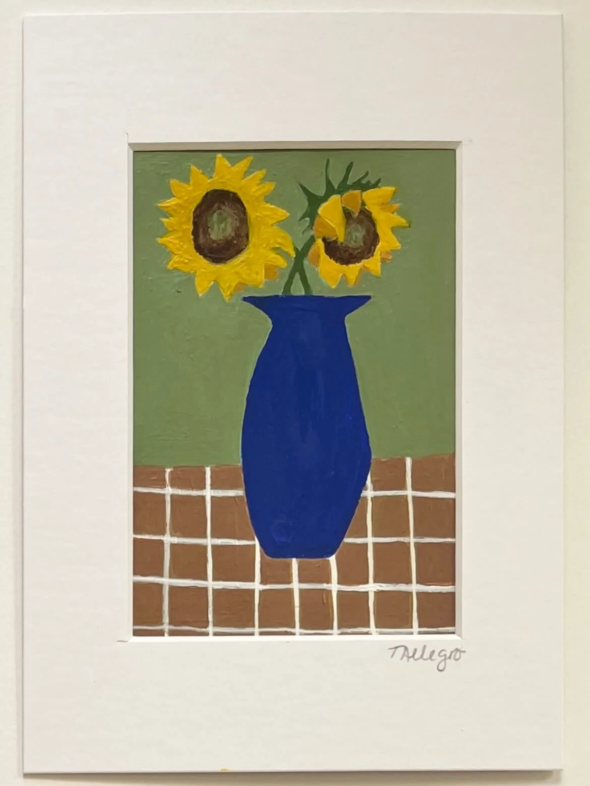 Sunflowers On A Brown And White Criss Cross Tablecloth