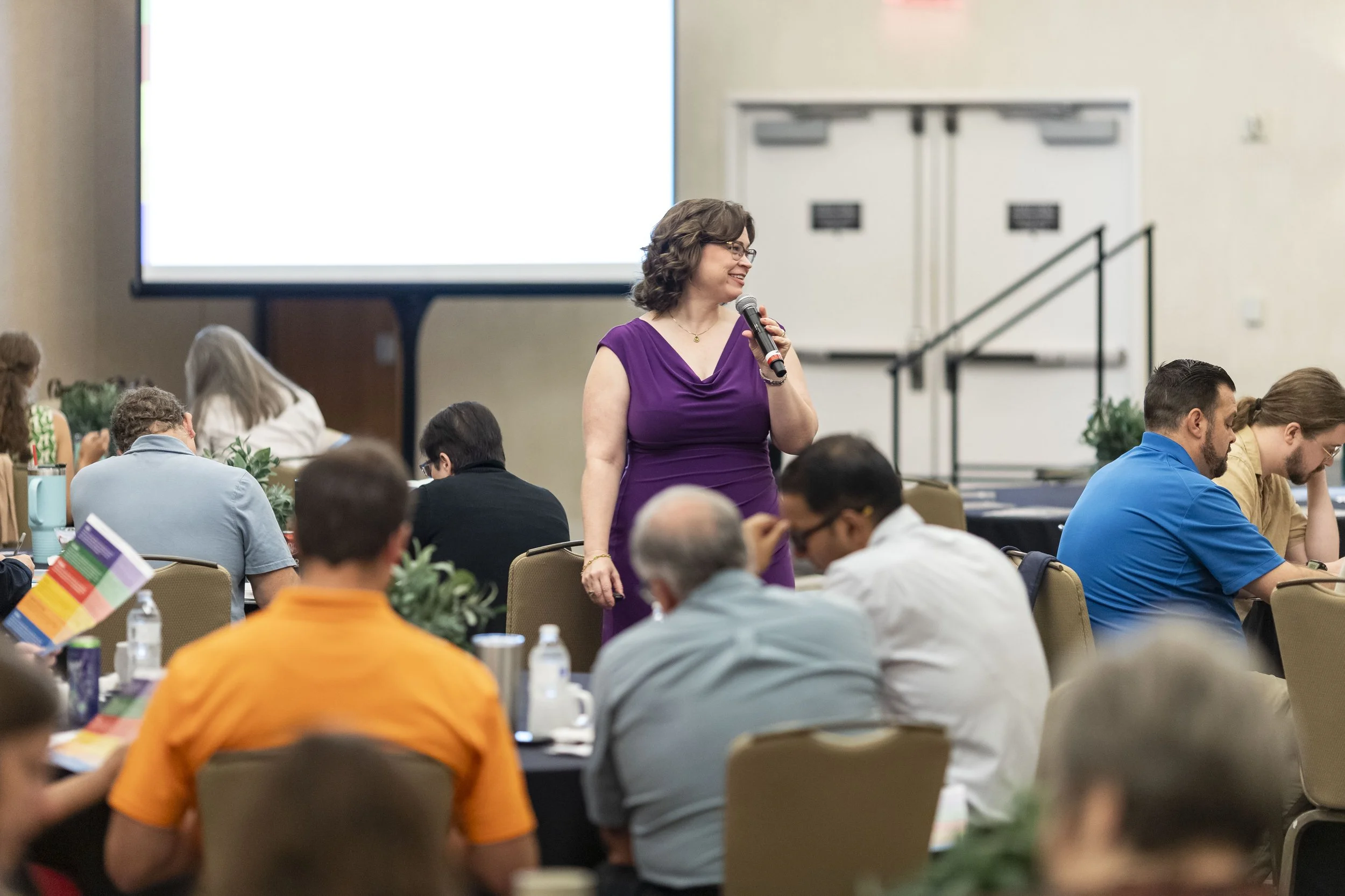 Lauren speaking at Newman University, photo credit Newman University