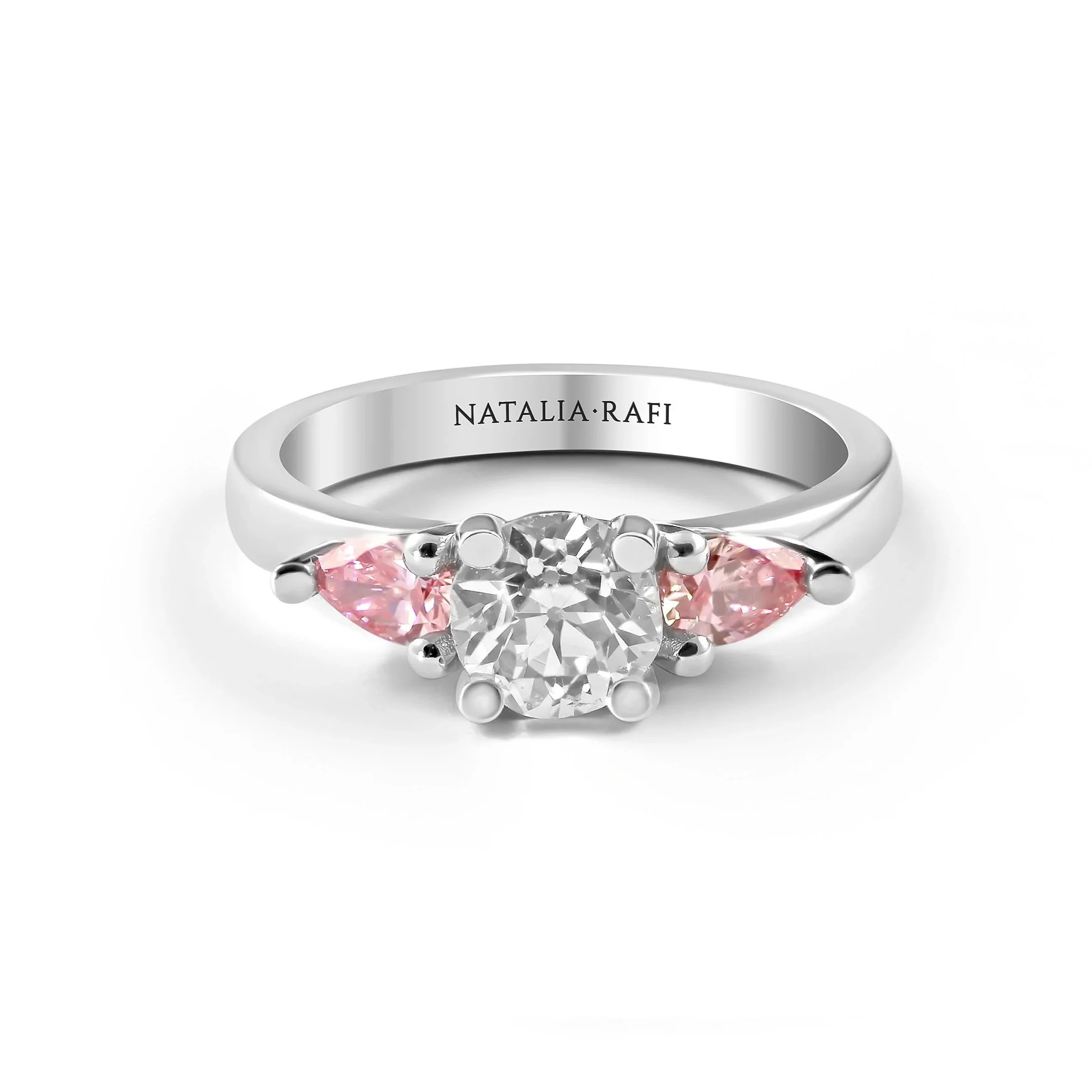 Round+diamond+and+pink+diamond+engagement+ring.jpg