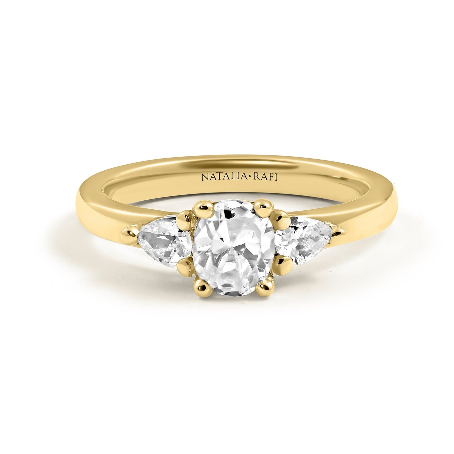 three+stone+oval+and+pear+diamond+engagement+ring+gold+2.jpg