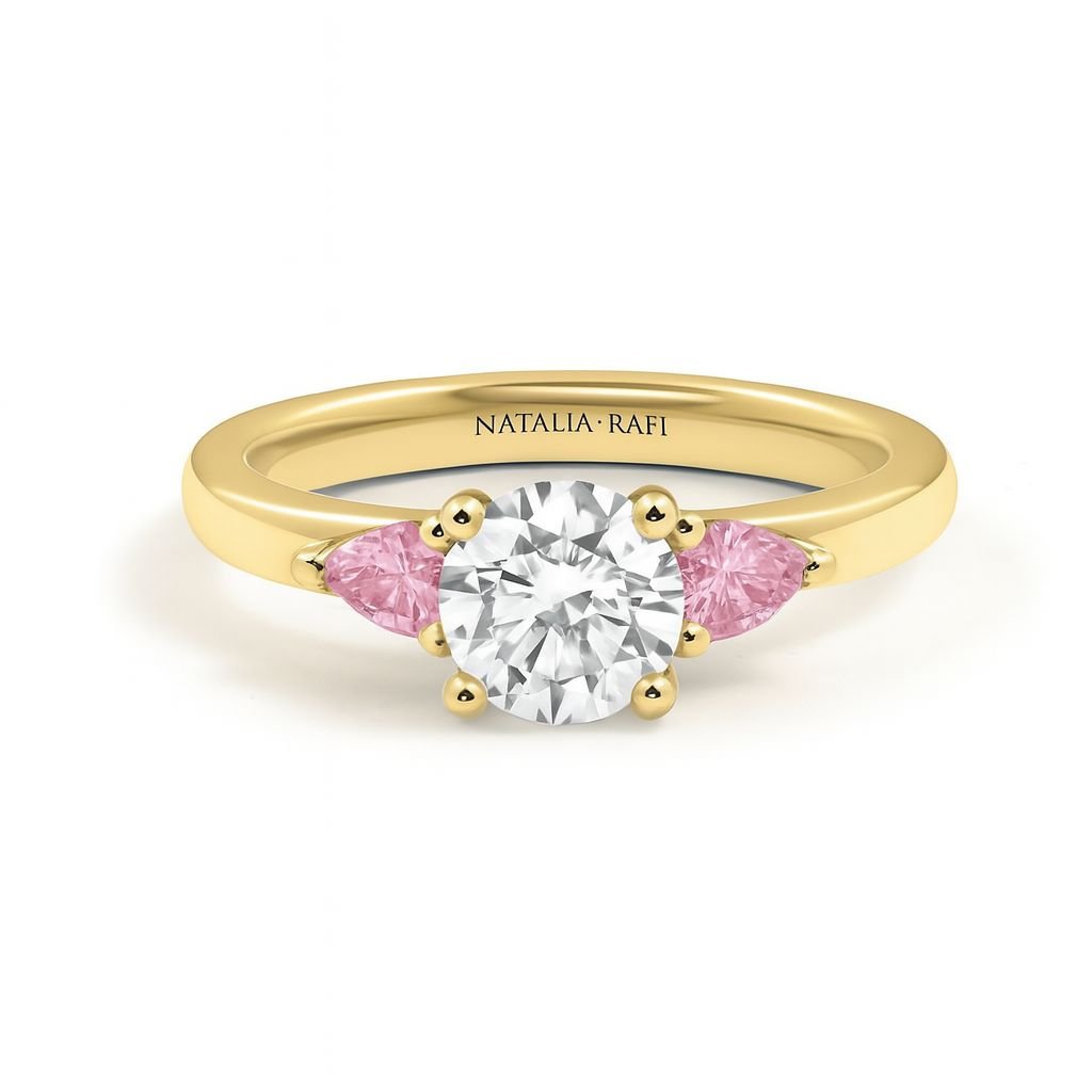 Ren - round diamond ring with pink diamond side stones.jpg