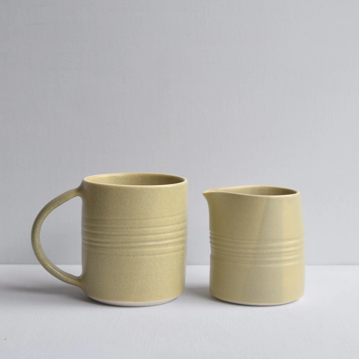 sage glazed porcelain mugs
