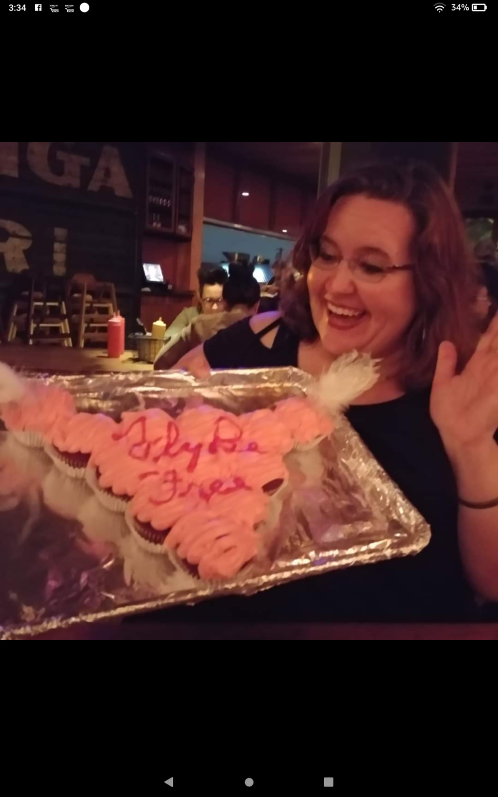 Carla Nell and her "goodbye uterus cake."