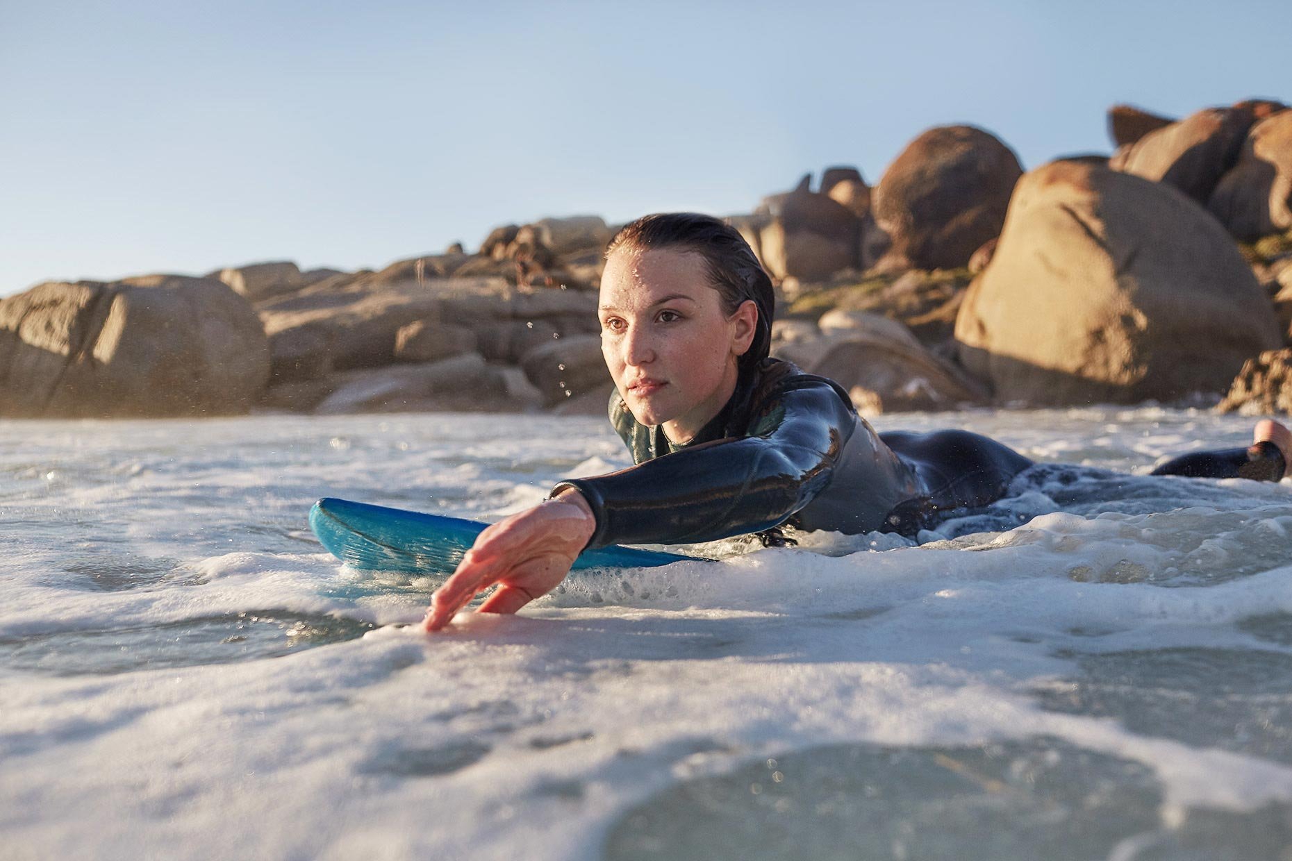 female-surfer-in-sea.jpg