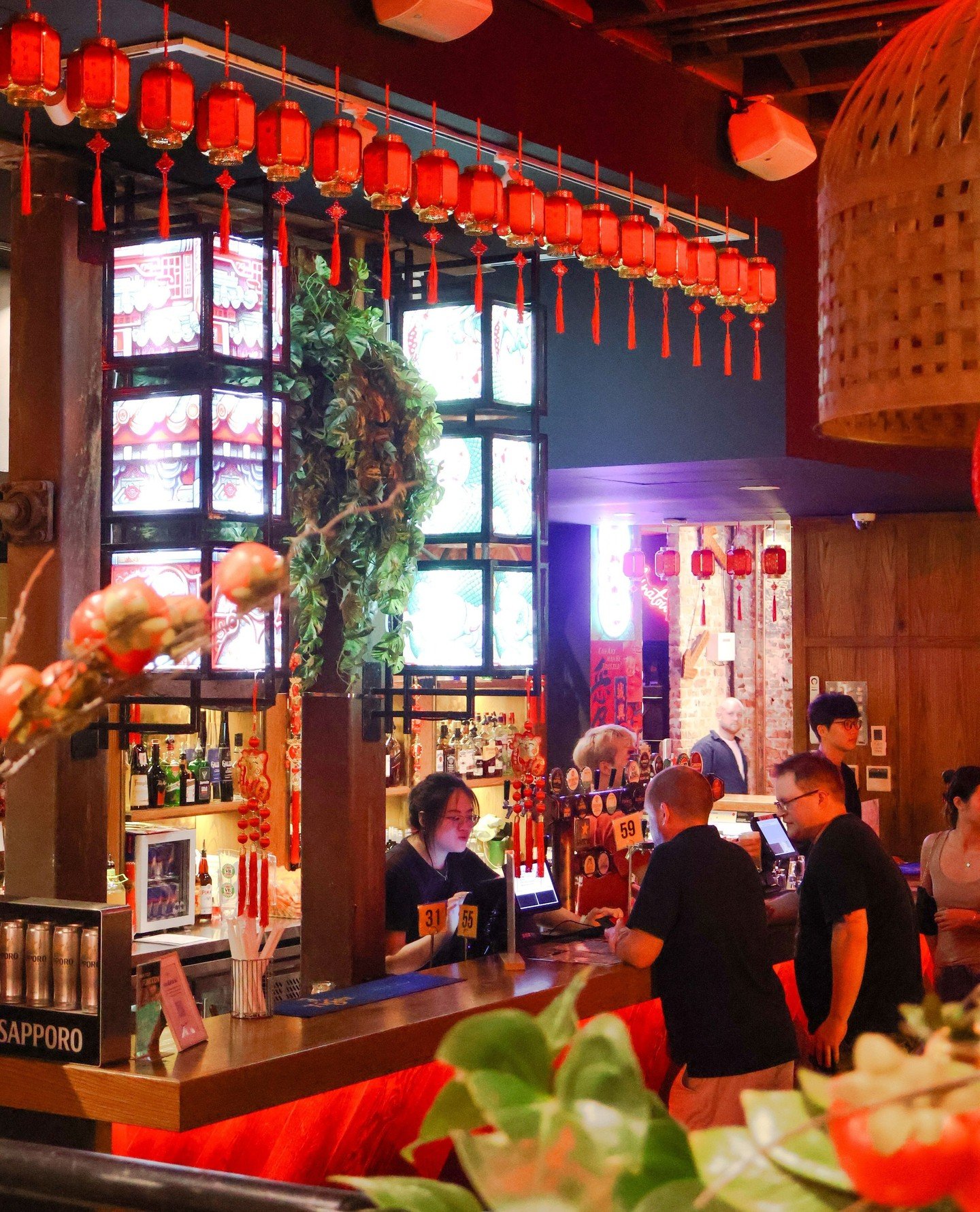 Saturday nights hit different under this glow. Come through. 🏮🍻