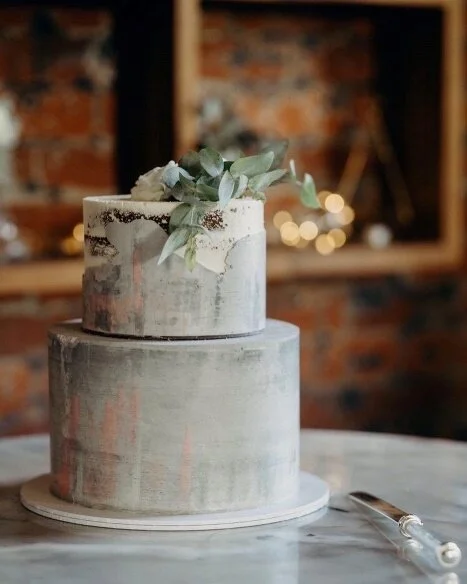 SEMI NAKED TWO-TIERED CAKE.