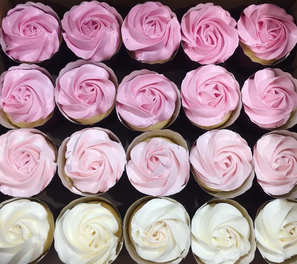 SEMI NAKED TWO-TIERED CAKE.