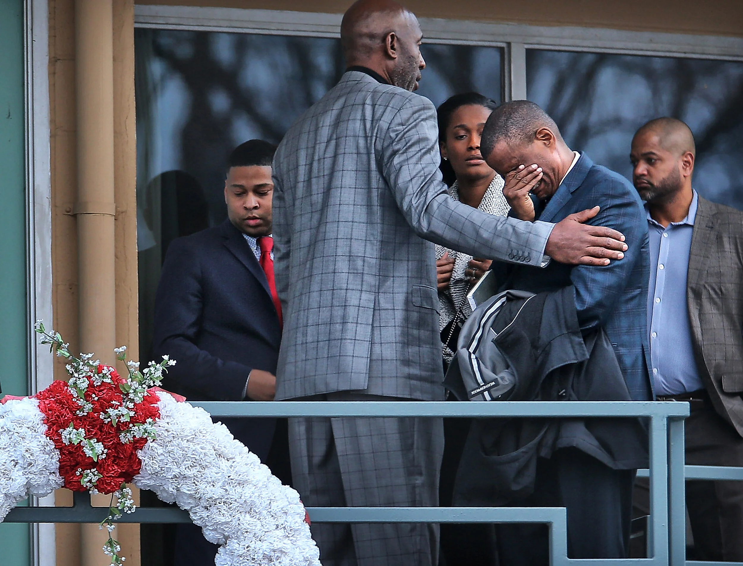  Basketball analyst David Aldridge is comforted by James Worthy and Swin Cash as they walk the Lorraine Motel balcony at the National Civil Rights Museum on Sunday January 14, 2018 during a tour. Worth and Cash are among this year's Legacy Award hono