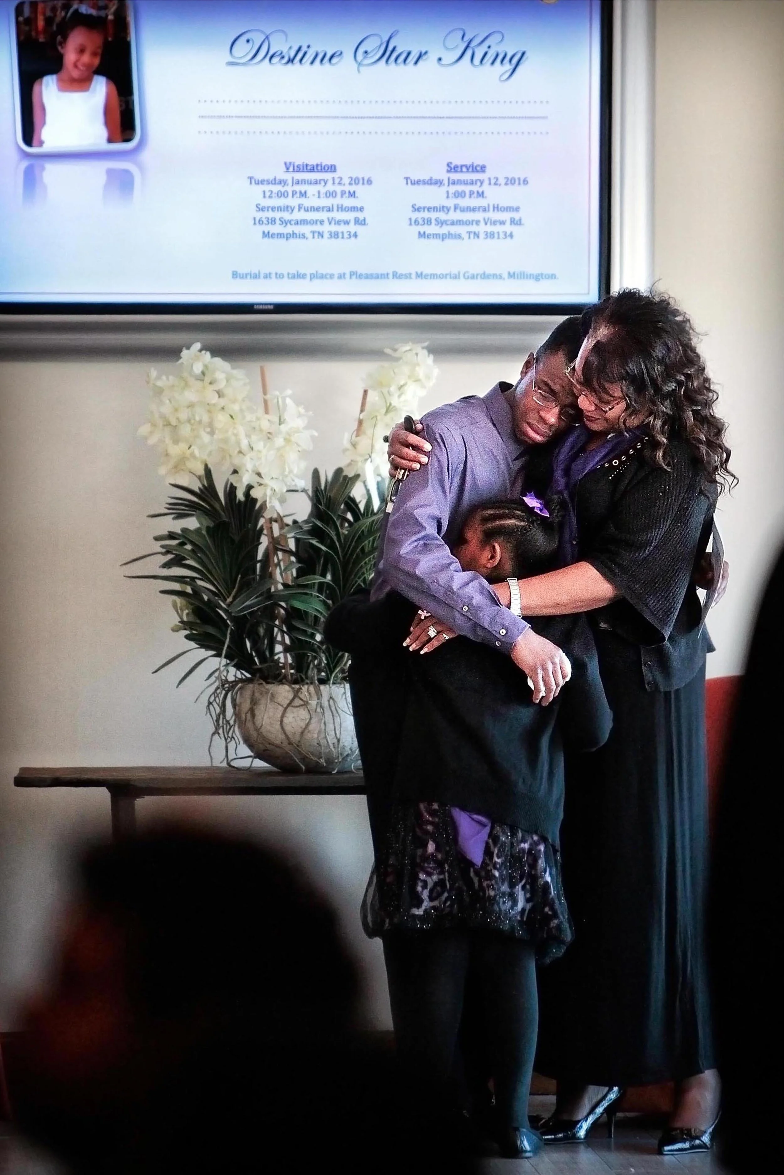  Cliffie Steward (right) comforts Mackavius Steward during a memorial service for his cousin 6-year-old Destine King at Serenity Funeral Home Monday afternoon. Her babysitter, Fourteen-year-old Antonio Evans has been charged with first-degree murder 