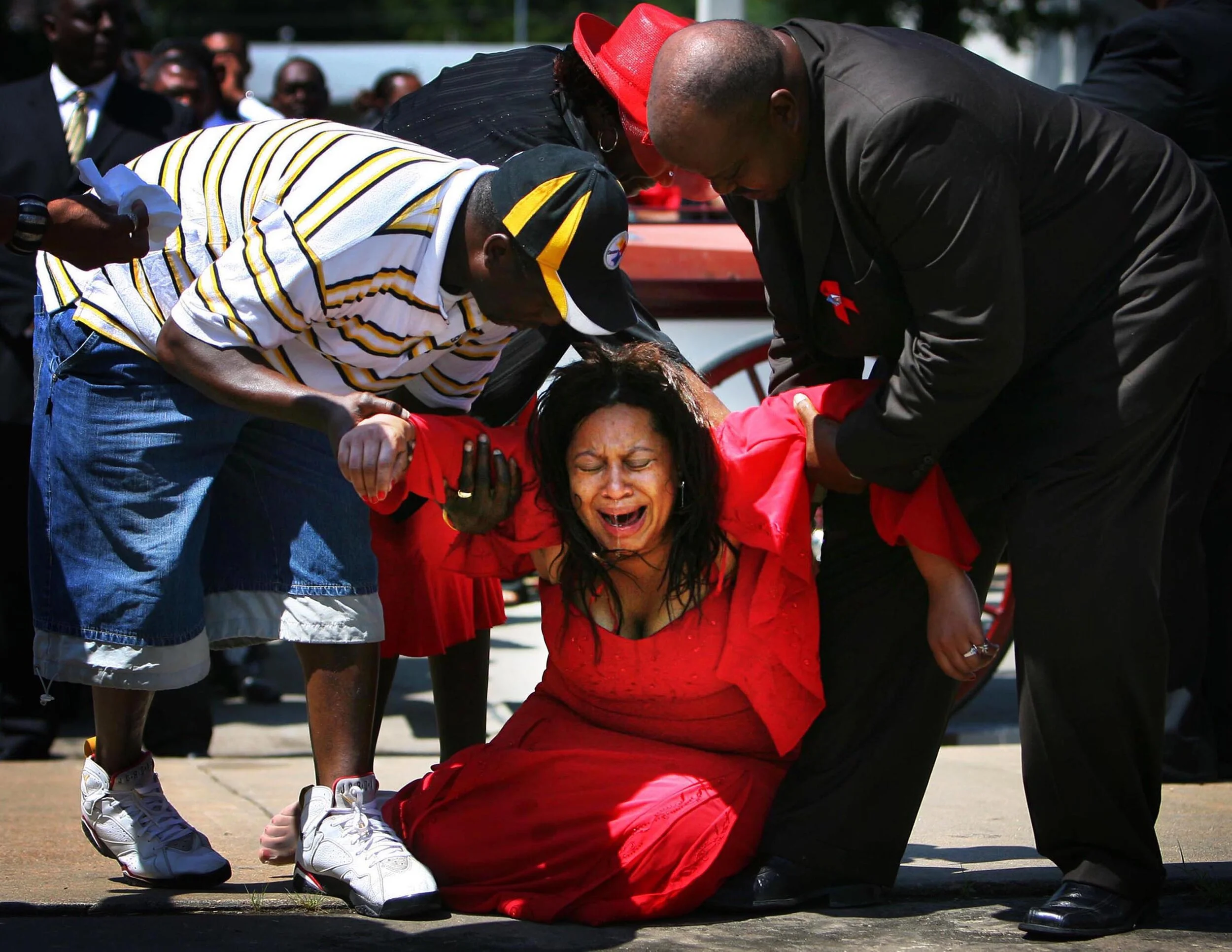  Beverly Farrow, mother of DeAunta Farrow, collapses in grief before the start of funeral services for the 12-year-old boy who was shot during a West Memphis police stake out last week. Services were held at the West Memphis Civic Auditorium after a 