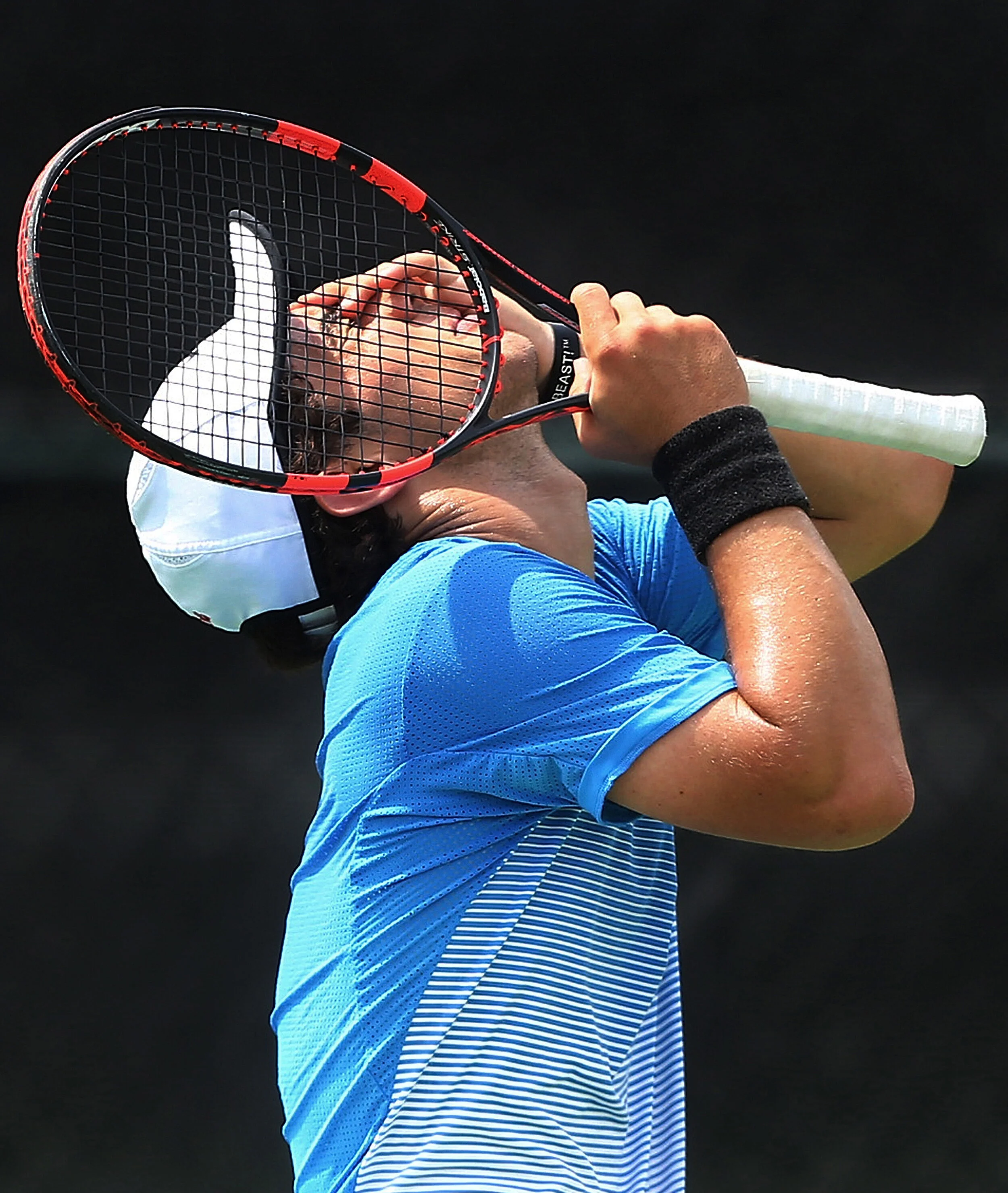  MUS singles player Andres Carro reacts to a string of missed points while competing against Baylor in the D2AA Tennis Team Finals at Spring Fling in Murfreesboro, Tenn. 