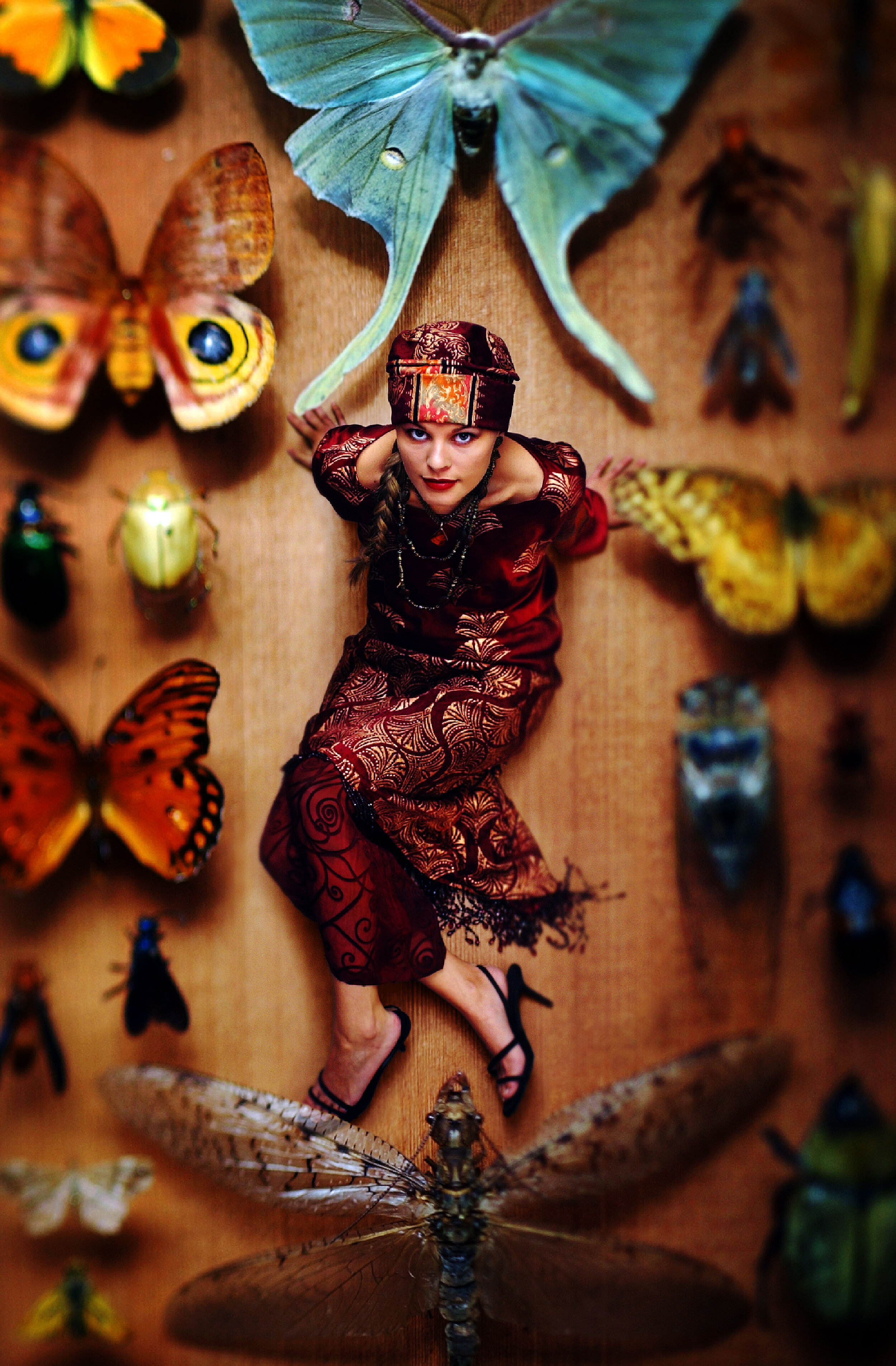  Exotic species:  A three-piece, silk, hand-painted ensemble by Mary Jane offers a tunic top, chiffon burnt-out pants in a Renaissance pattern and skirt with beaded fringe and matching hat. 