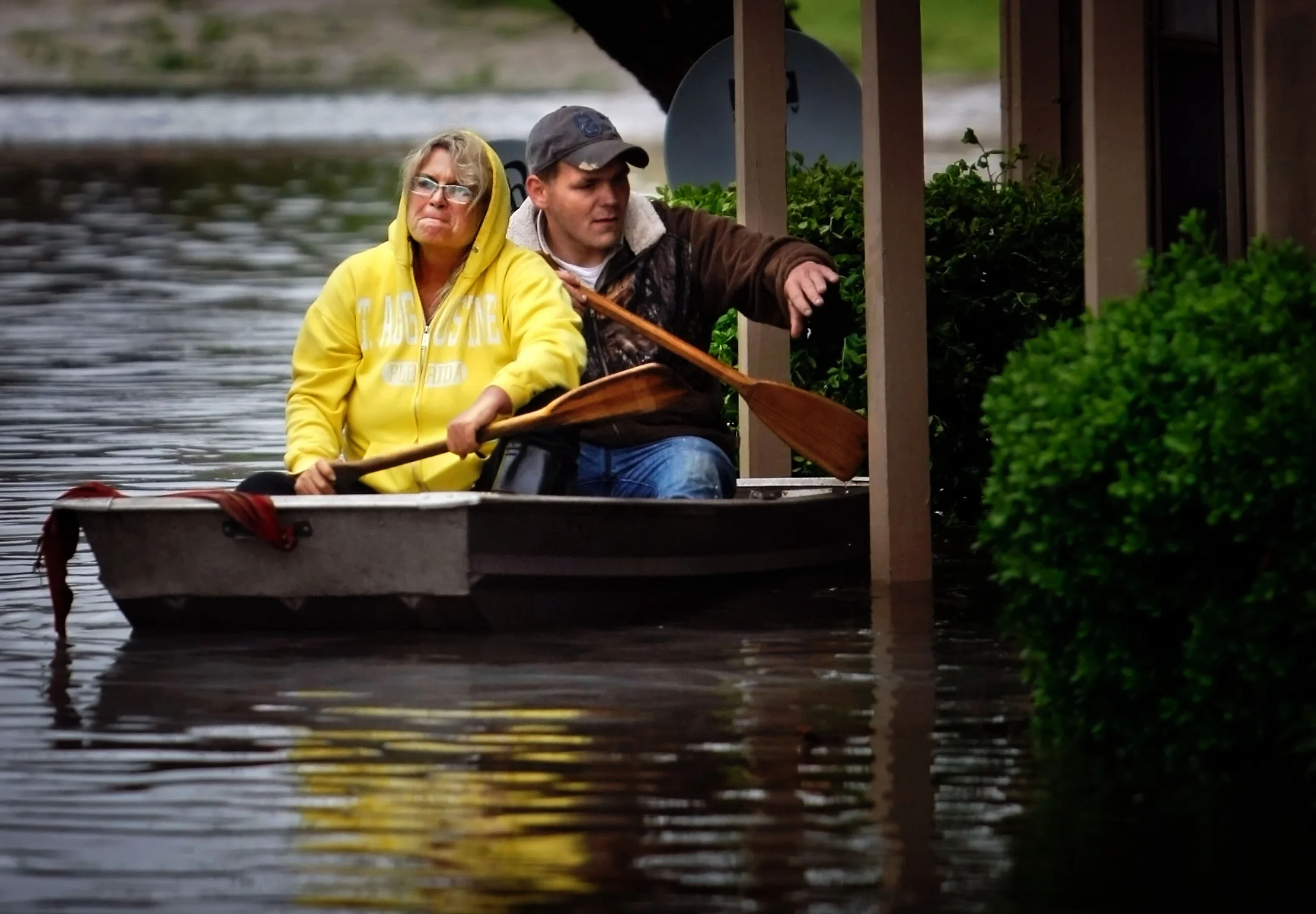  Crystal Goedereis and Chad Banks row through the Riverbend Apartments to check on their home as flood waters swamp the complex. With the Mississippi at flood stage, West Memphis was declared a disaster area by the state as rains continue to pound th