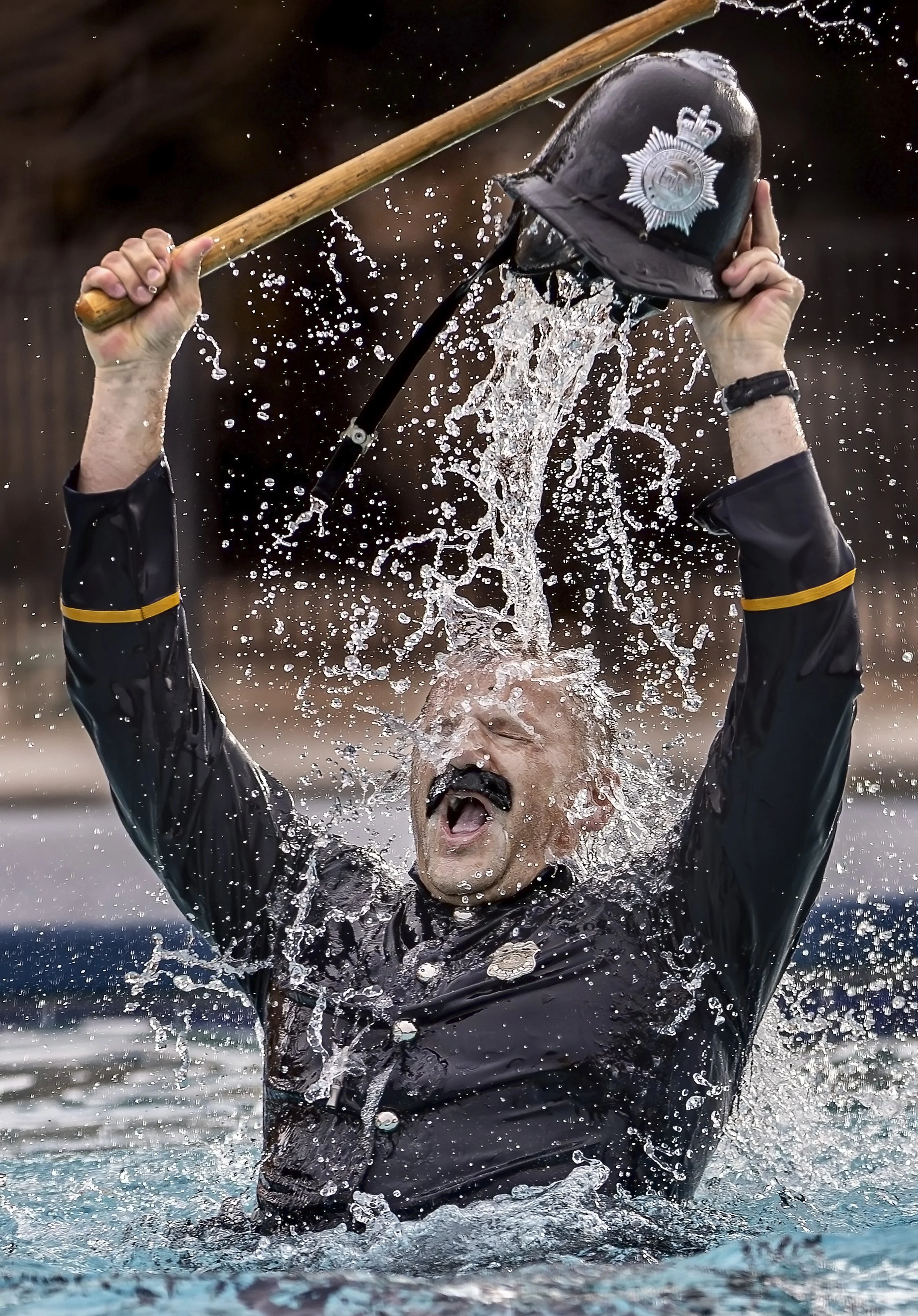  Los Alamos Deputy Chief of Police Oliver Morris shakes off the icy chill celebrating his polar plunge as volunteers from local law enforcement agencies took a chilly dip in the pool at the  Buffalo Thunder Resort to raise almost $5 thousand for the 