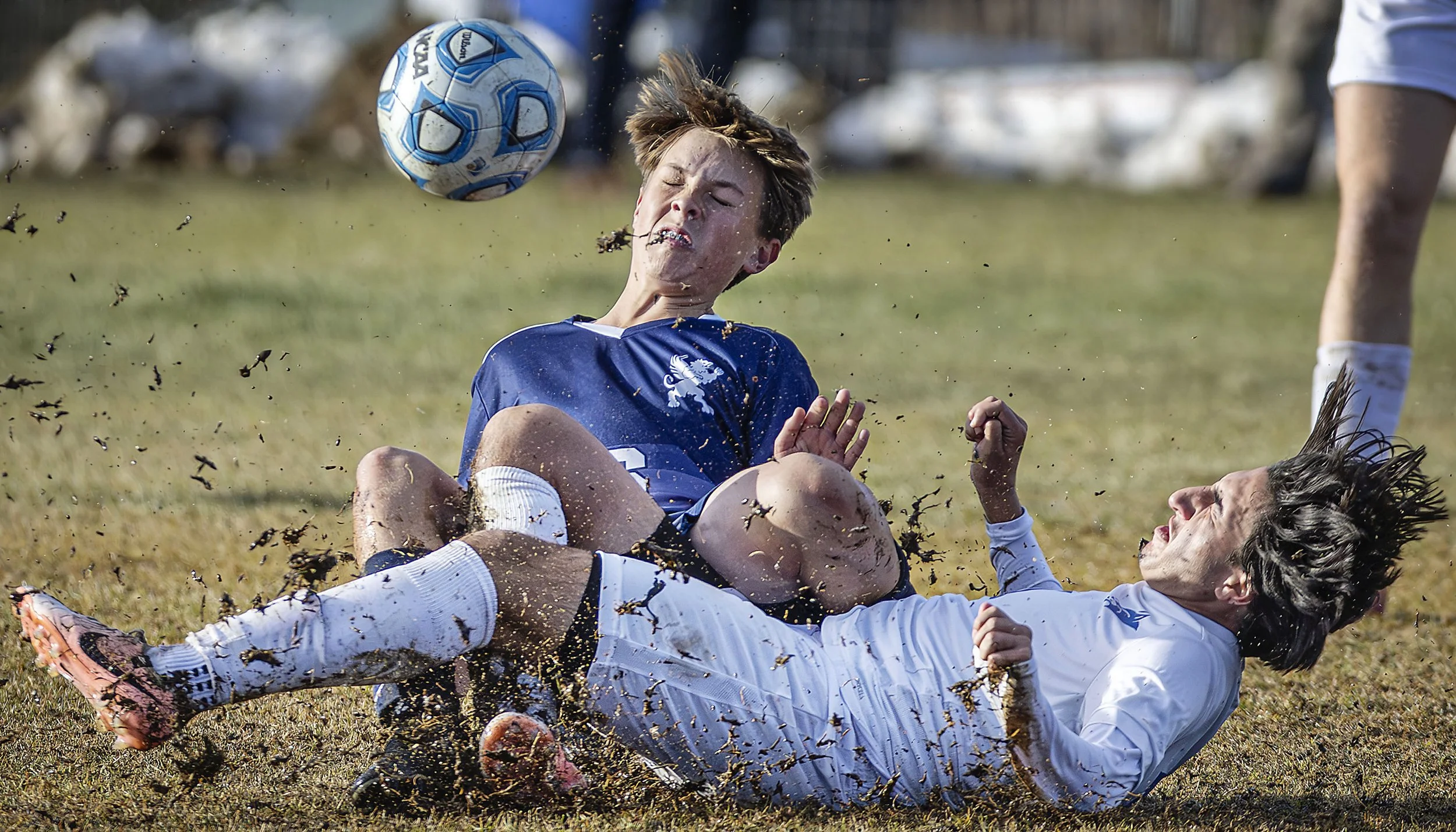  Griffins defender Liam Baker collides on a sliding steal with Bobcats midfielder Amadeo Sandoval during Santa Fe Prep's Class 3A state semifinal game against Albuquerque Bosque on Tuesday, Nov. 5, 2024 at Sun Mountain Field . 