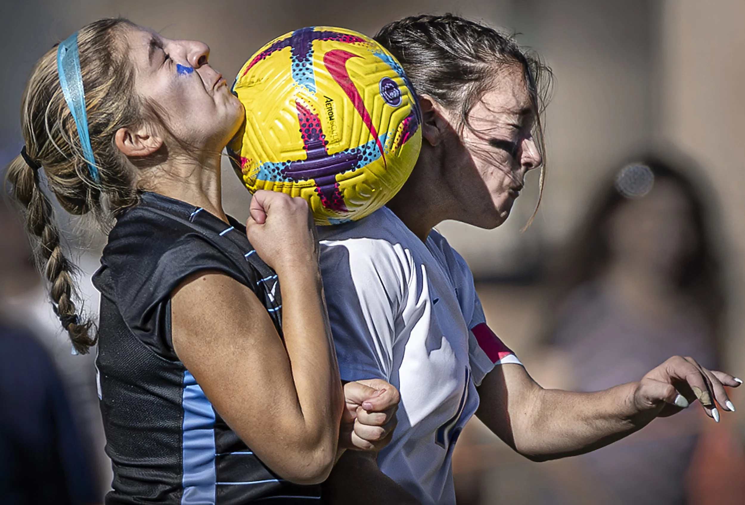  Horsemen forward Sophia Miera (right) collides on a header with Sundevils defender Kaylin Rodriguez during St. Michael's loss to Sandia Prep in their state semifinal matchup in Albuquerque on Nov. 7, 2023. 