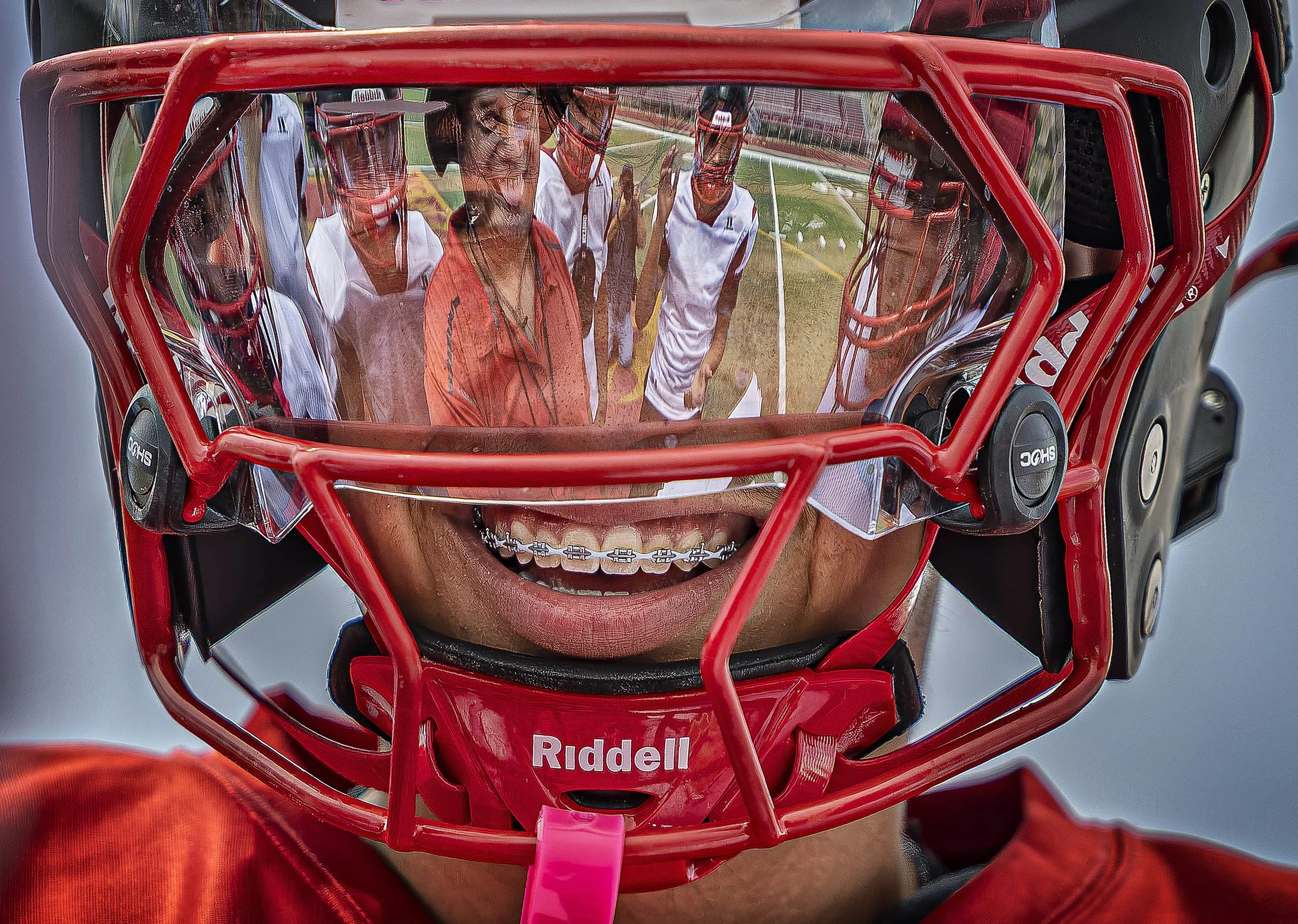  Sundevils quarterback Isaiah Gallegos jokes with teammates in the huddle during practice at Española Valley High School on Tuesday, Aug. 11, 2026. Española Valley starts the 2026 season with its third coach in as many years. New head coach Frank Gal