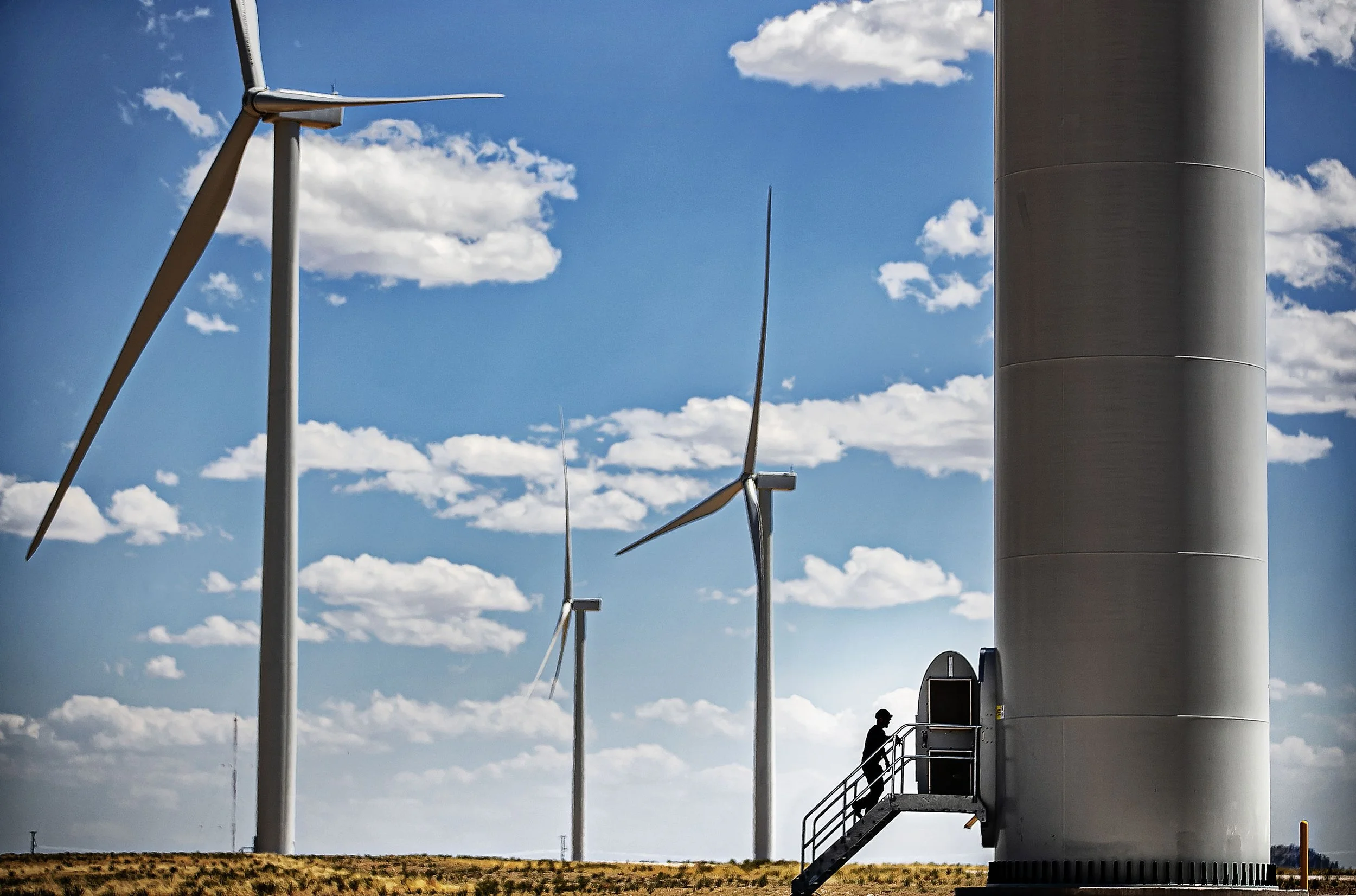  General Electric technician Francisco Mendoza repairs a brake disc on one of the wind turbines at the Duran Mesa Wind Farm near Duran, New Mexico on May 18, 2022. Pattern Energy is finalizing plans for another farm nearby, the Corona Wind Project, w