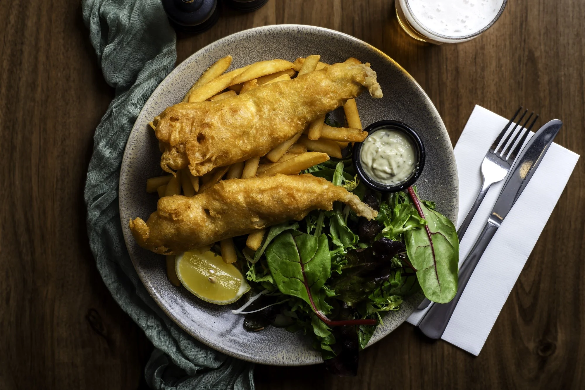 Fish and chips with salad and tartare sauce at The North Star Hotel.