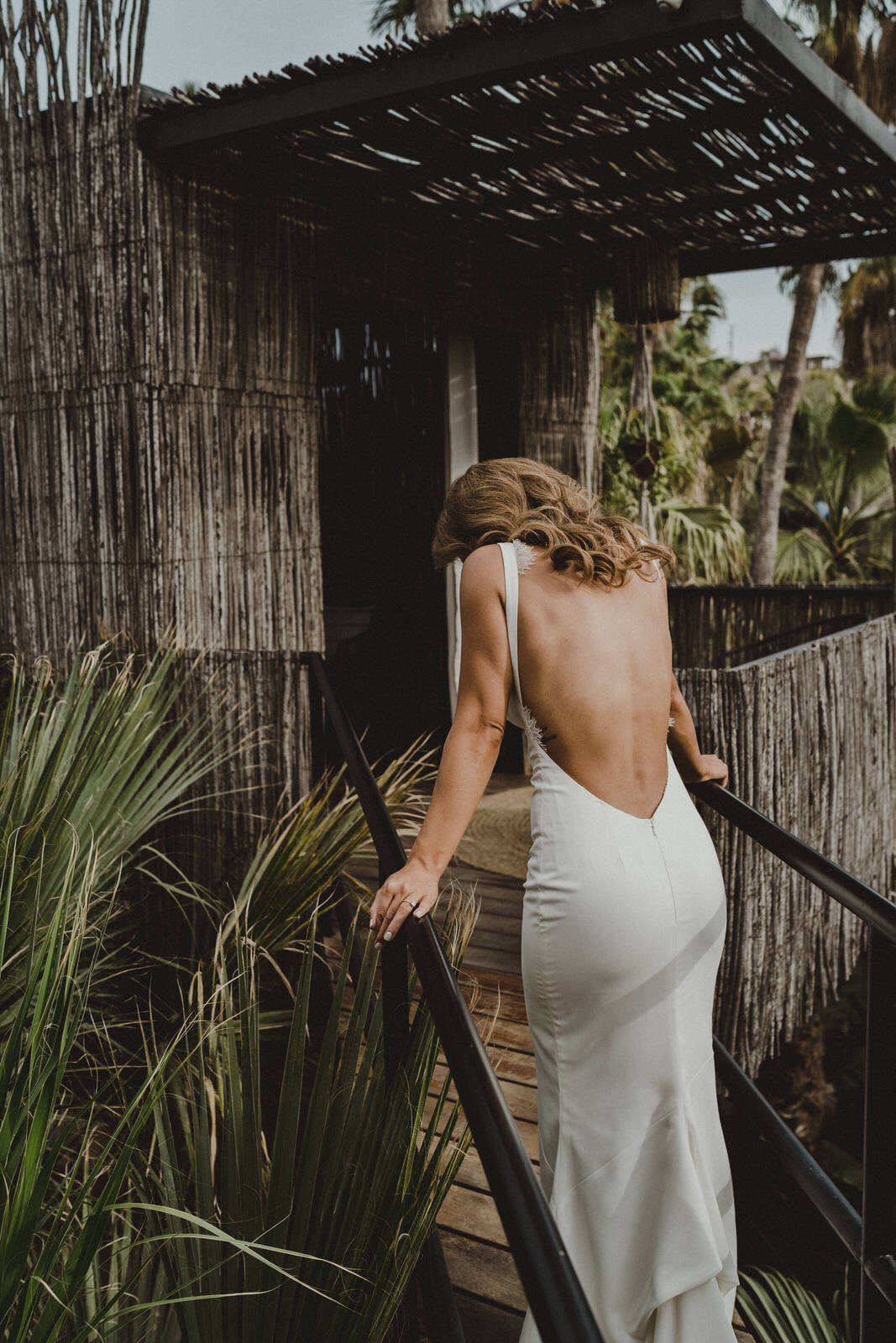 bride getting ready in a treehouse 