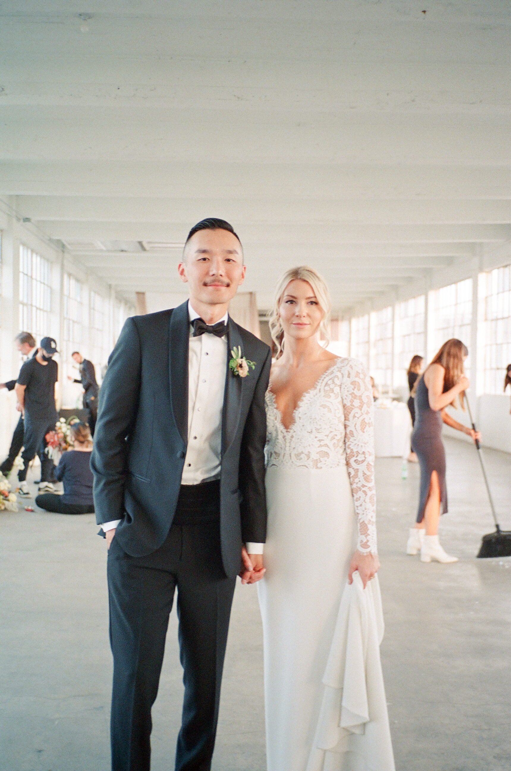 BRIDE AND GROOM AT THE CEREMONY AND RECEPTION SITE AT LOFT 1923 IN LA