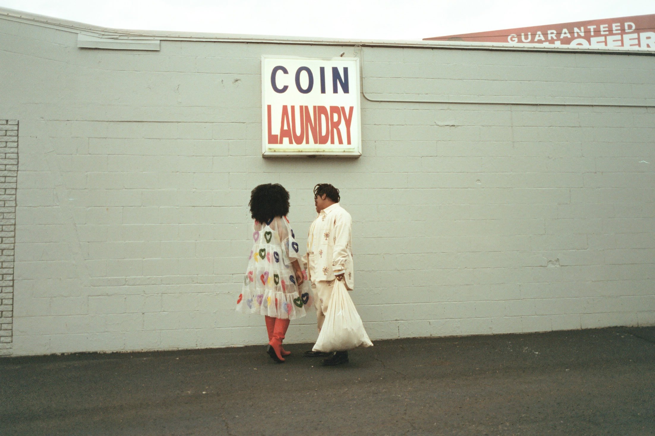 a lesbian couple outside in east nashville on their wedding day