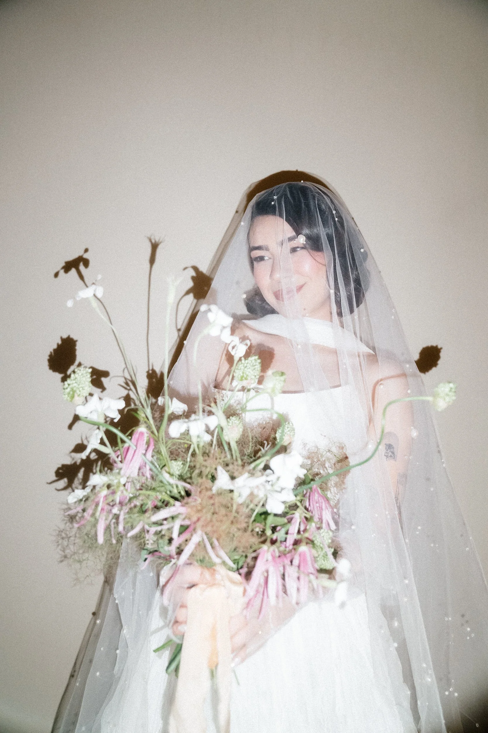 bride on film in seattle with a heart flash 