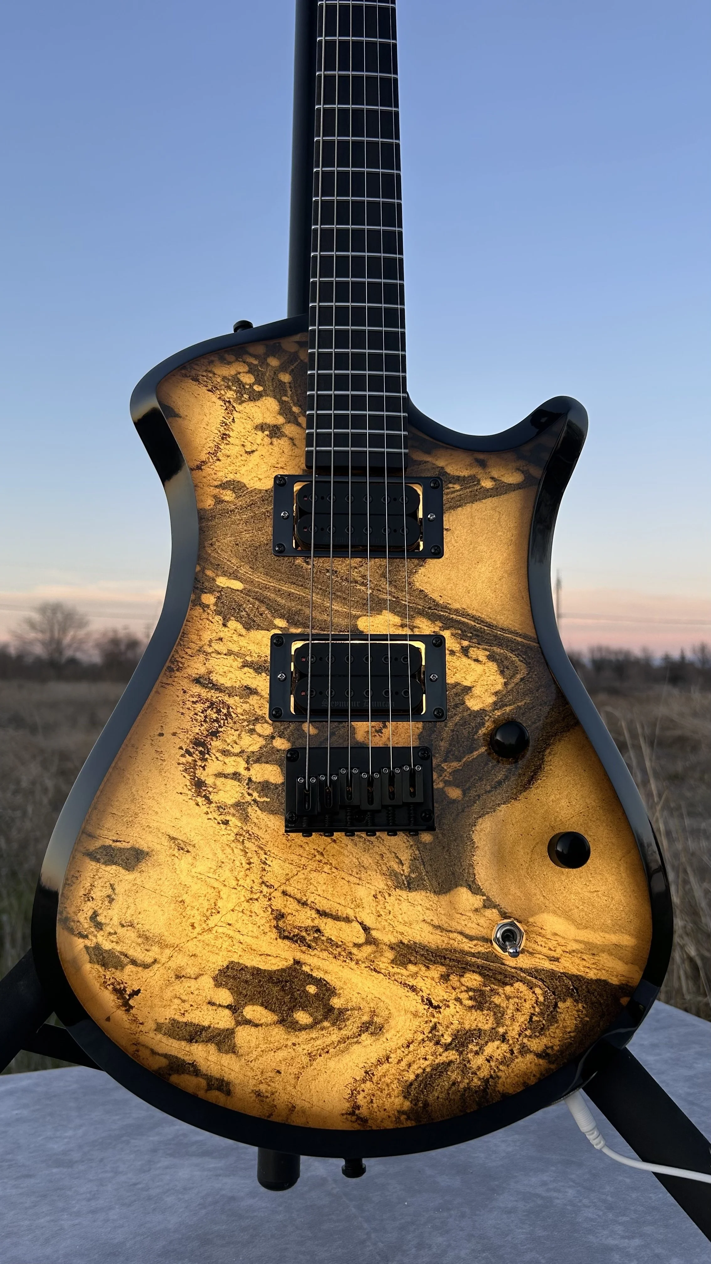 Stone Custom- A hollow body design with a translucent stone top