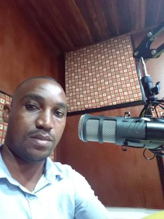 Shubert Mwarabu on air at Radio One Stereo's Kumepambazuka