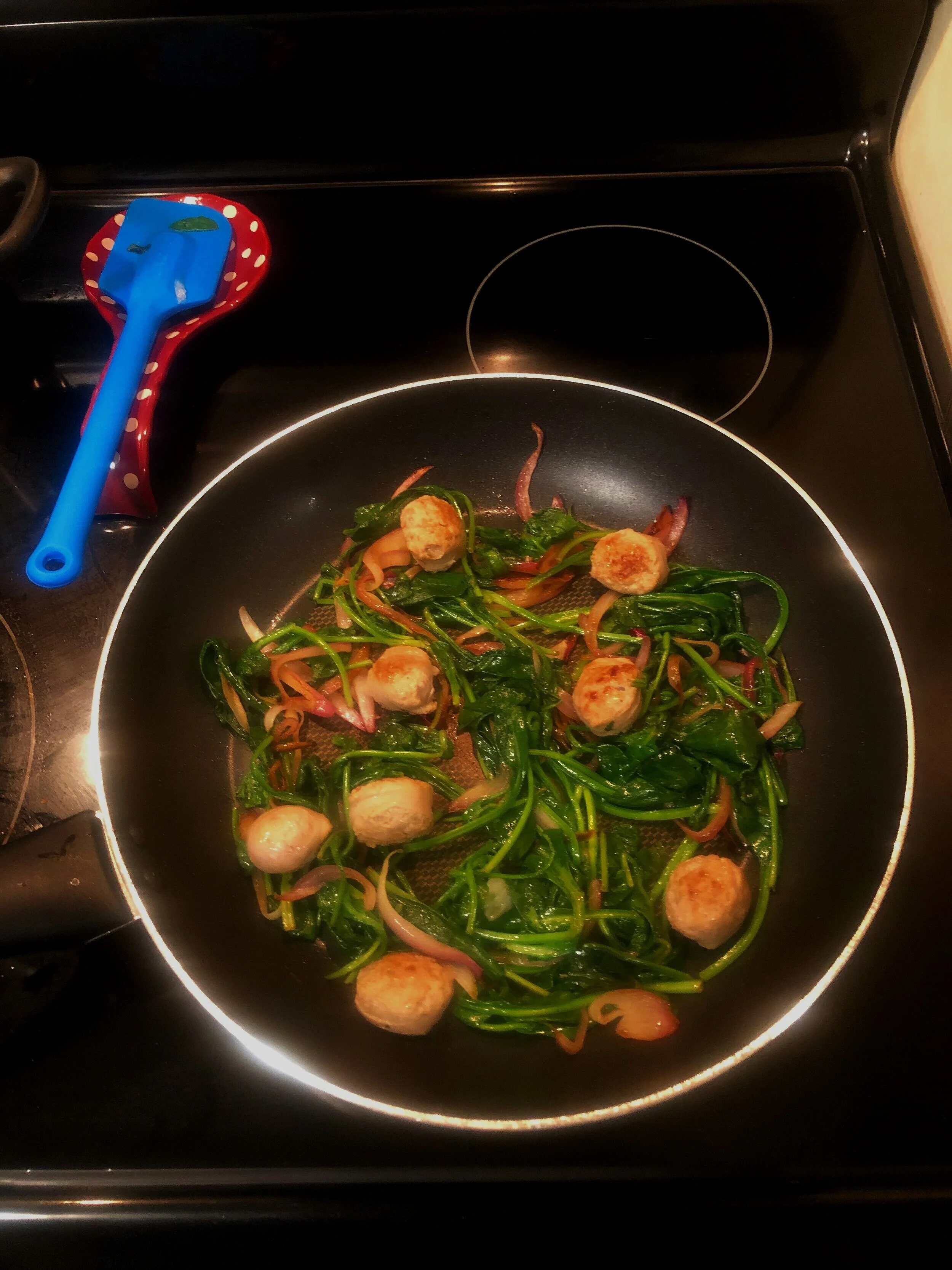 The other night, I cut up some sausage and pan fried it with spinach and red onion. It went swimmingly with some brown rice pasta :)