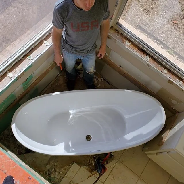 Perfect fit!🎉 Today was tub fitting and jack hammer day at Mimi &amp; Papa&rsquo;s!! Tomorrow it&rsquo;s plumbing fittings and Monday it&rsquo;s the rest of demo and TILE TIME!! PS I ❤️ finding old wallpaper behind years of paint and thinking about 