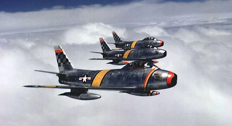 Col. Benjamin O. Davis Jr., commander of the 51st Fighter Interceptor Wing, leads a three-ship F-86F Sabre formation during the Korean War. US Air Force. Credit