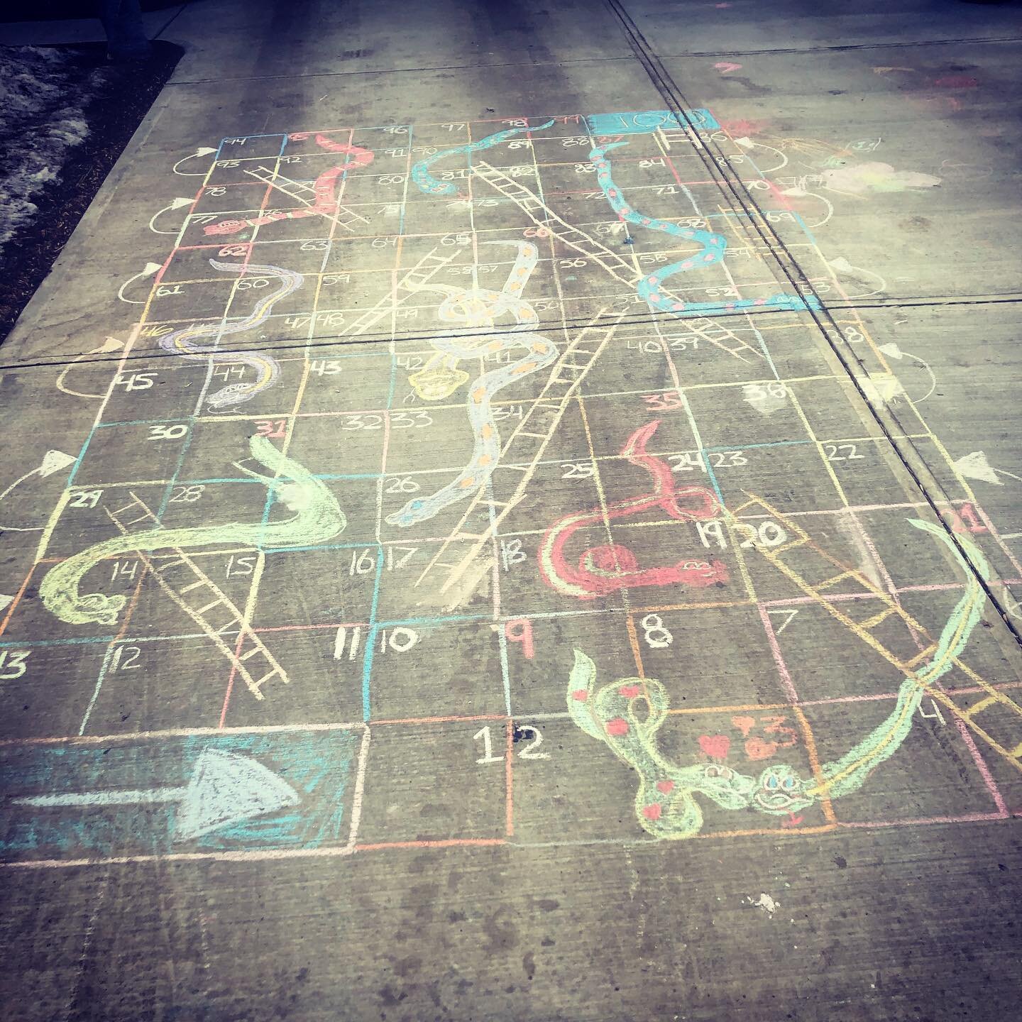 So we are one week away from the one year anniversary of the national lockdown for COVID-19. We made a giant snakes and ladder game in March 2020 and have done it again March 2021. 
Who knew one year later we would still be in the midst of a global p