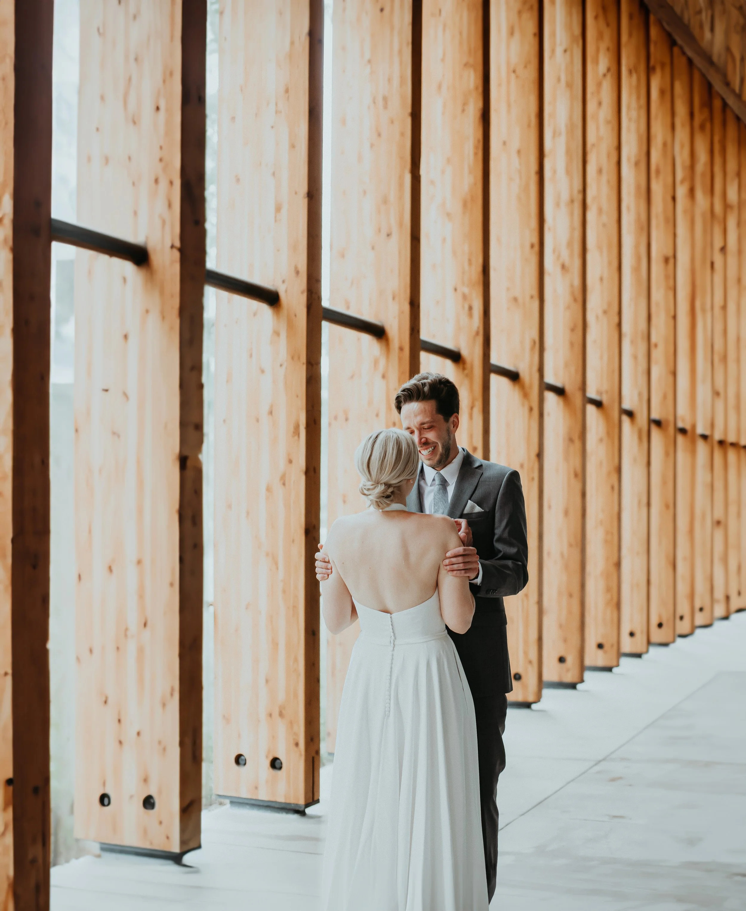 Groom gets emotional during first look with bride at Minnesota wedding
