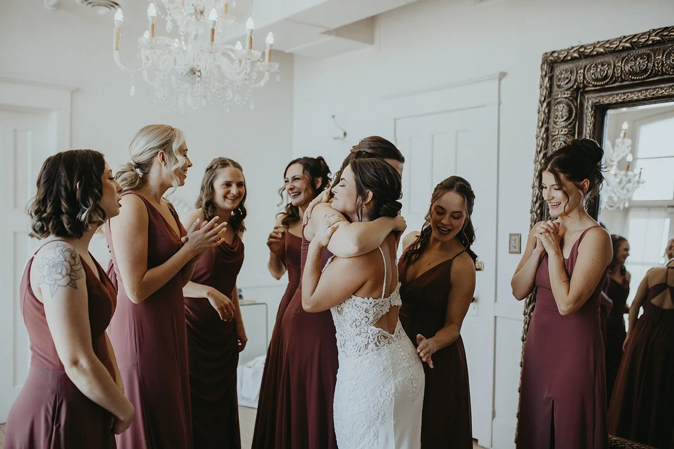 Emotional moments between bride and bridal party