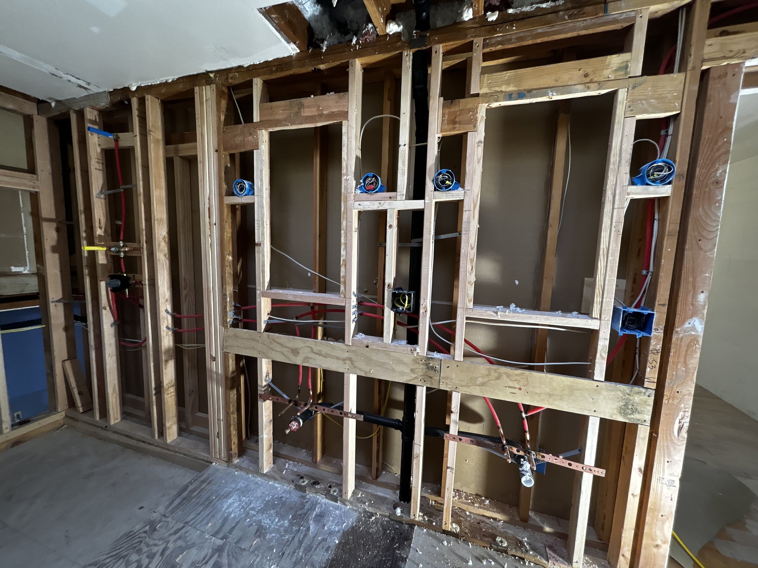 handyman service, Bellevue, WA, Principle Bathroom, new plumbing, shower, reframing work, curbless shower, before pictures, framing work, vanity area, home renovation needs